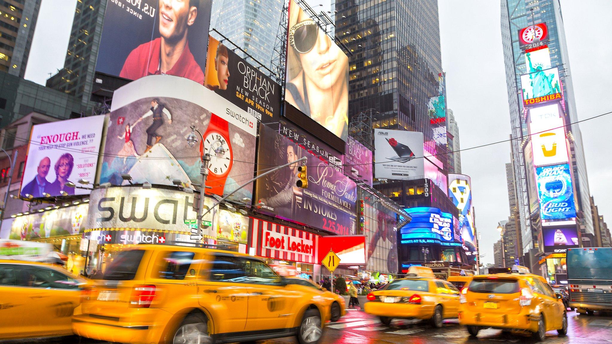 Yellow taxi cabs in traffic on 7th Avenue at Times Square, Broadway, Midtown Manhattan, New York City