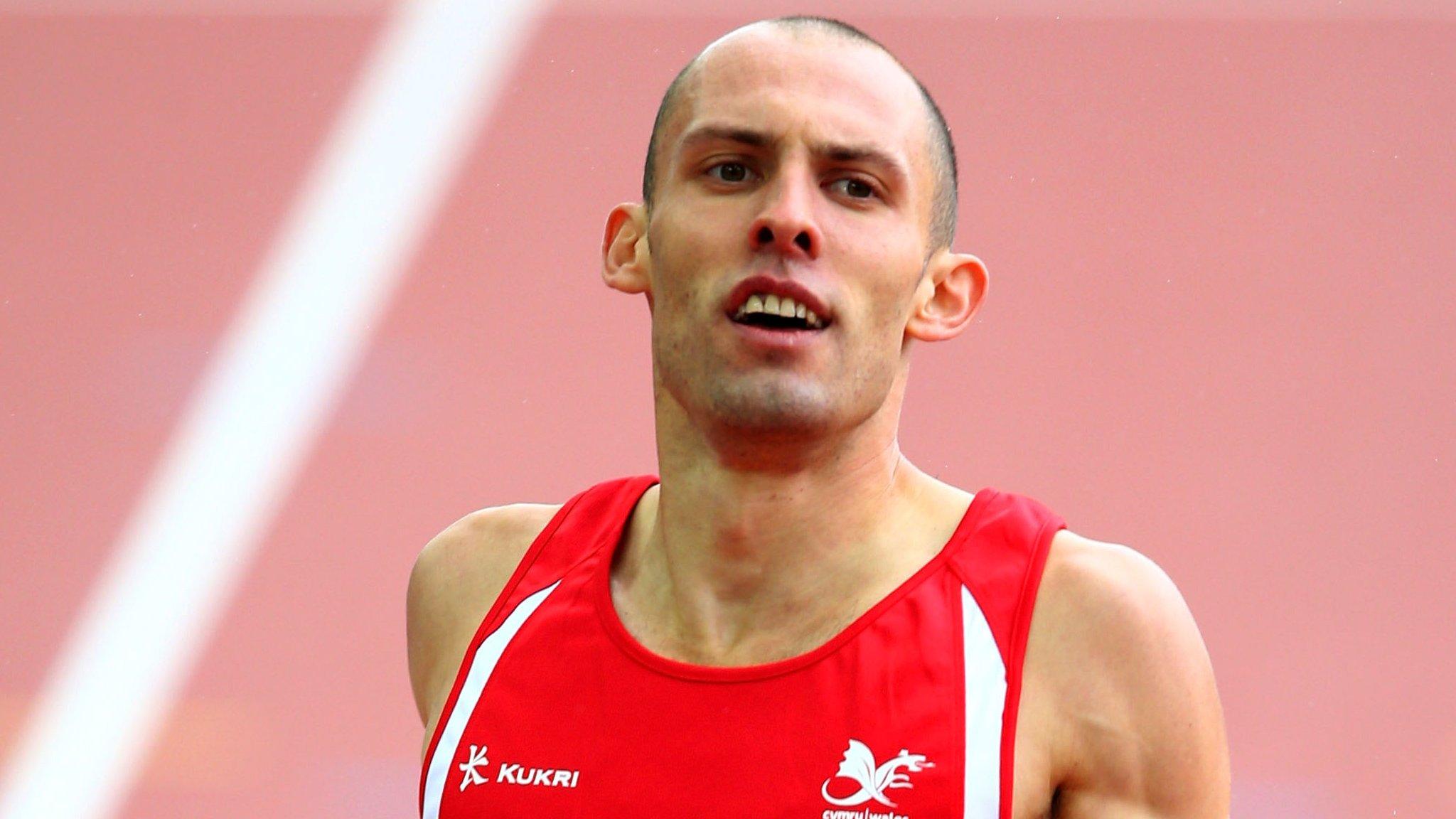 Dai Greene competing for Wales at the 2014 Commonwealth Games