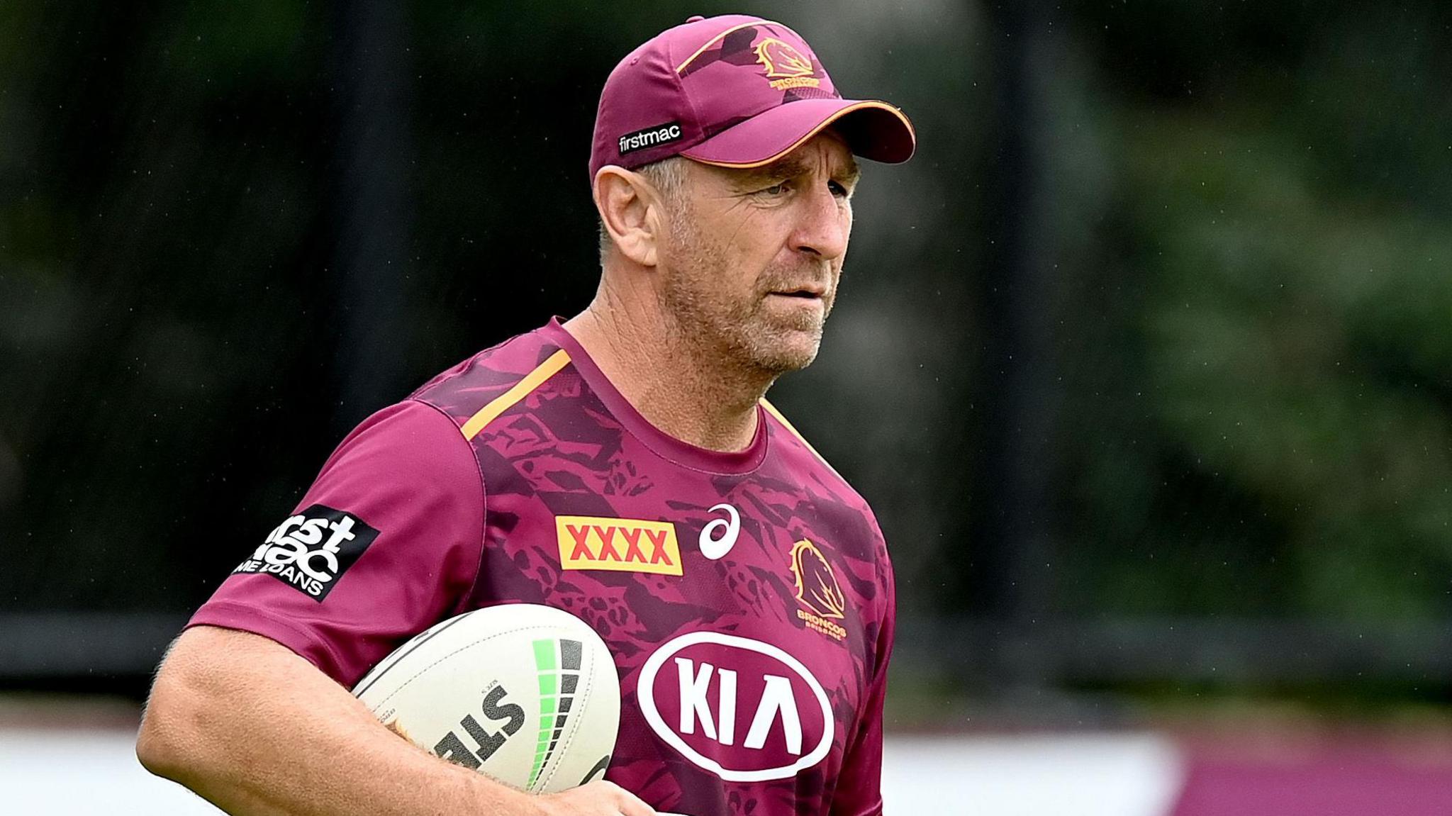 John Cartwright working at a Brisbane Broncos training session in full club gear  