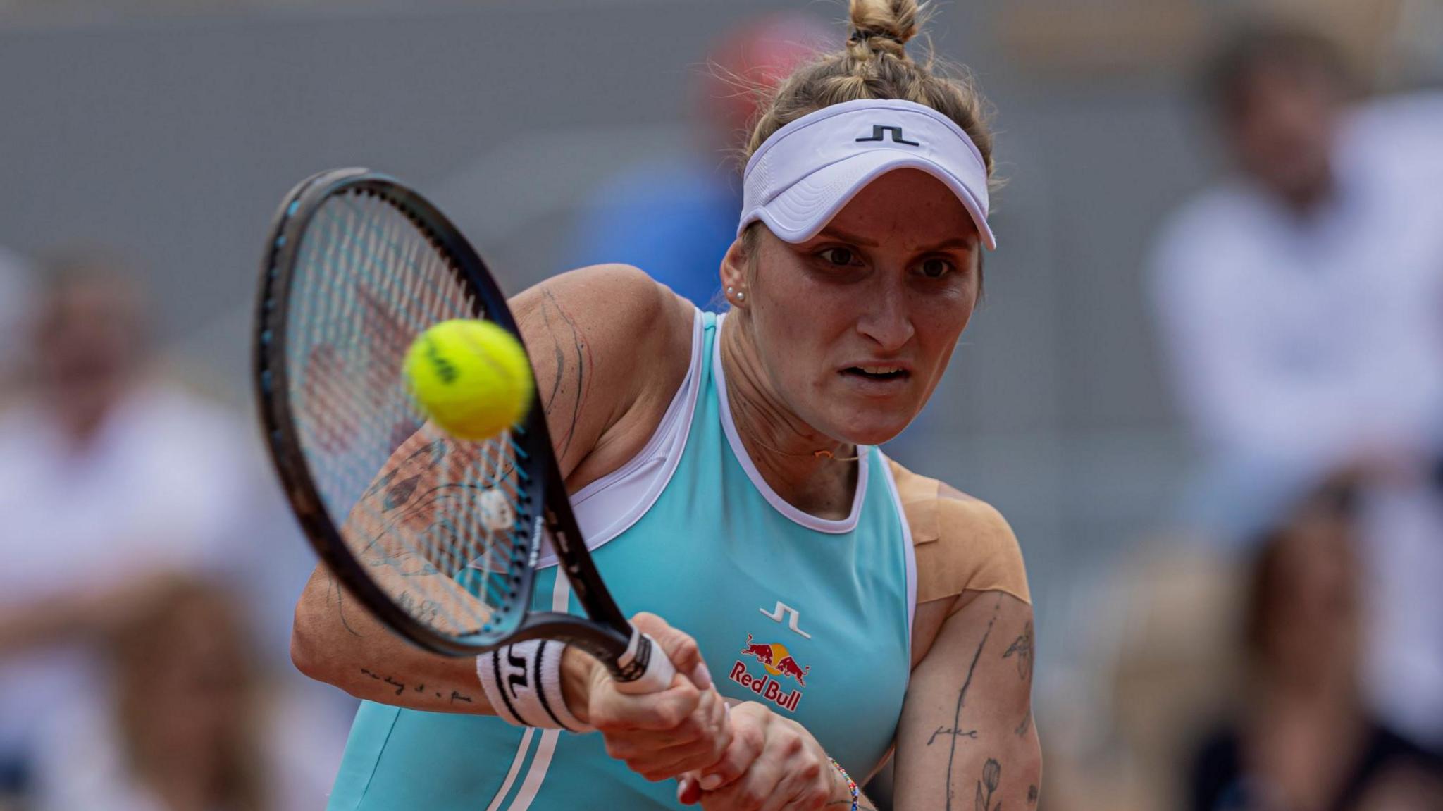 Marketa Vondrousova plays a backhand