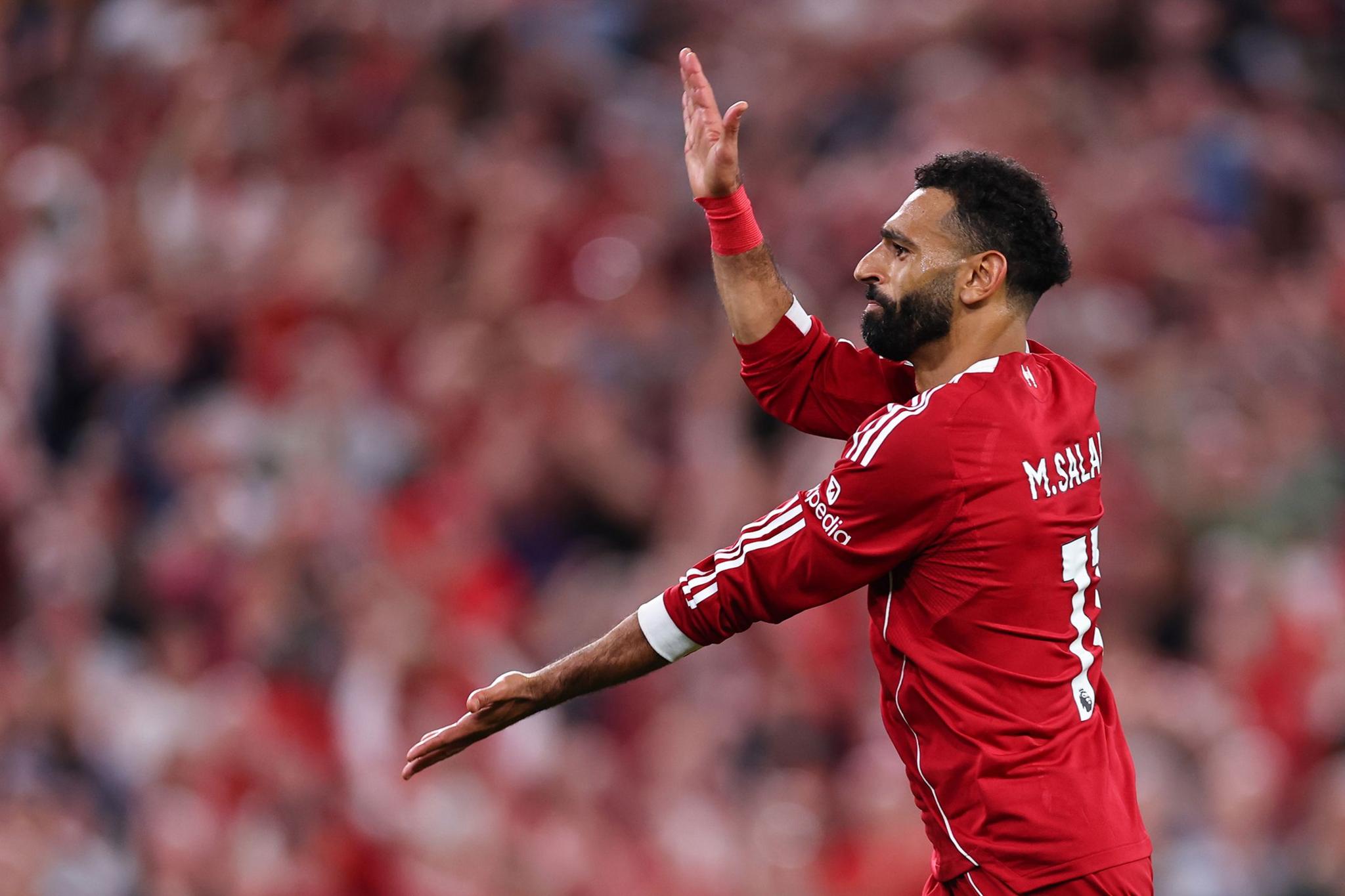 Mohamed Salah dedicates his goal and celebration to Diogo Jota having scored to make it 4-2 at Anfield. Photo by Robbie Jay Barratt