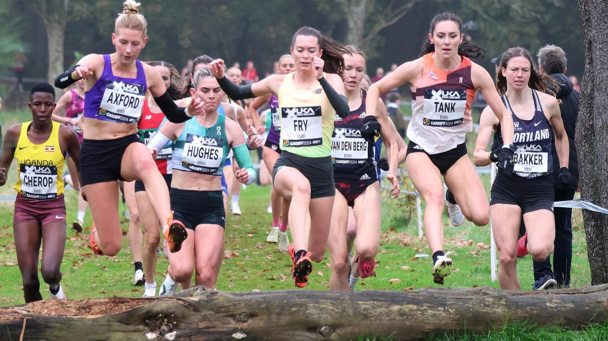 Charity Cherop (far left) approaches a log hurdle at the 2024 event in Cardiff behind a host of other competitors