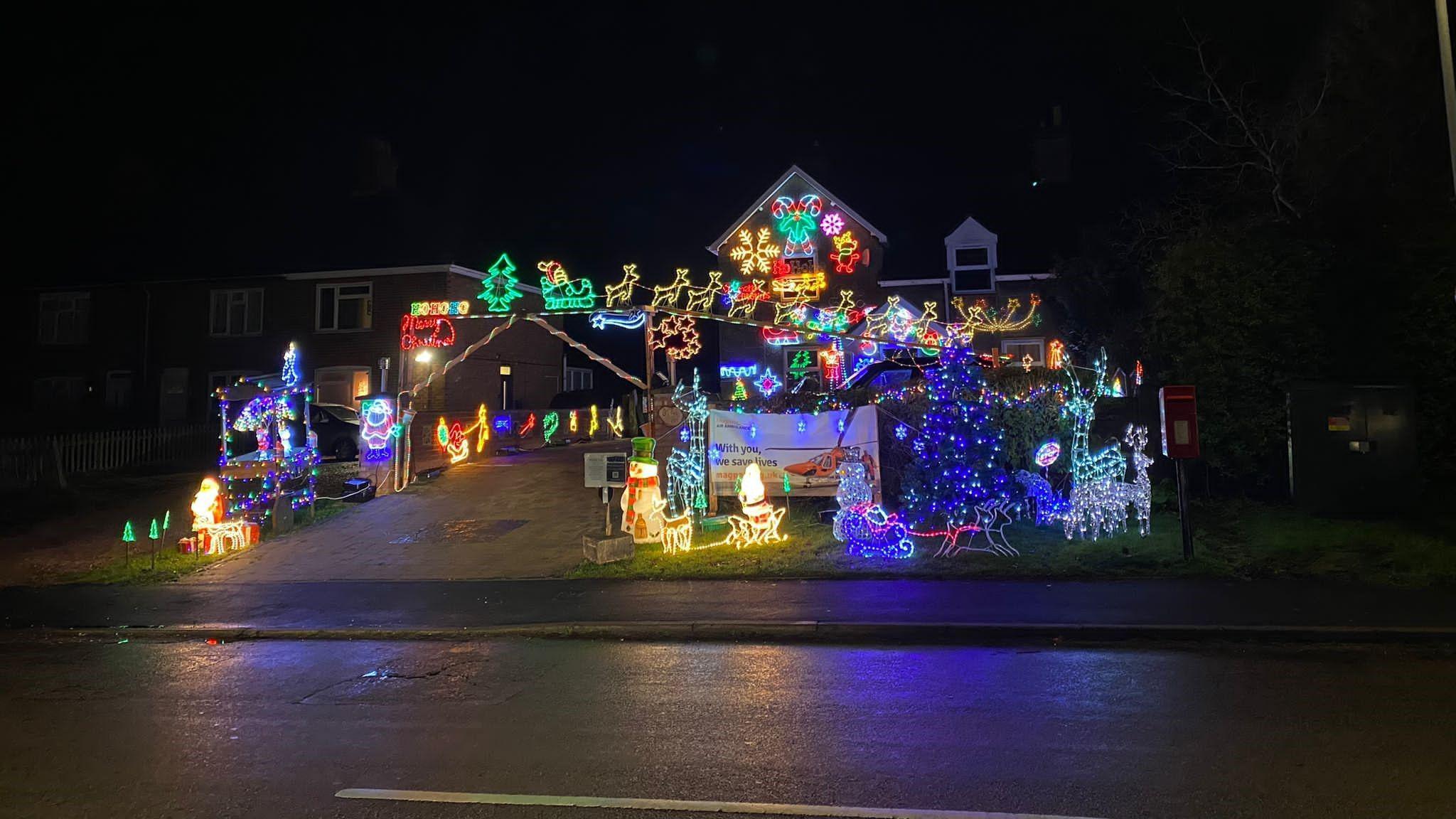 Christmas decorations display in front of a house