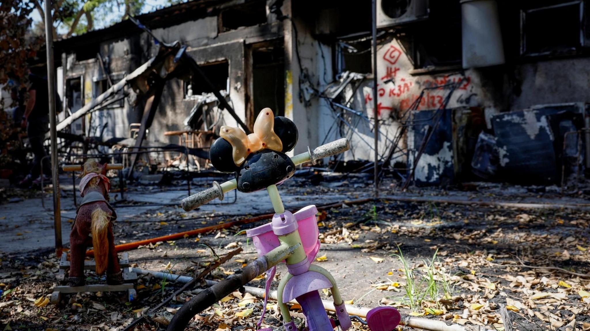 A child’s bicycle is seen at Kibbutz Nir Oz, in southern Israel, following a deadly attack by Hamas-led gunmen (30 October 2023)