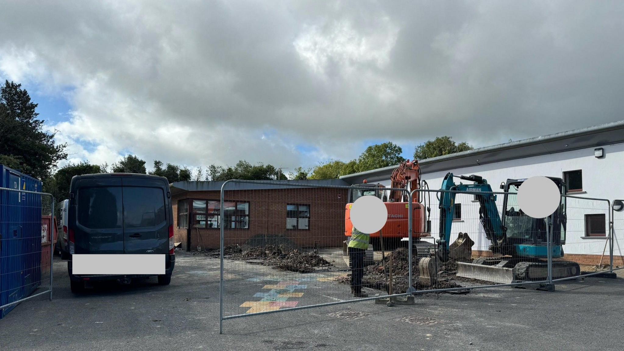 Oakwood School in Saintfield. Two school buildings with diggers and workmen.