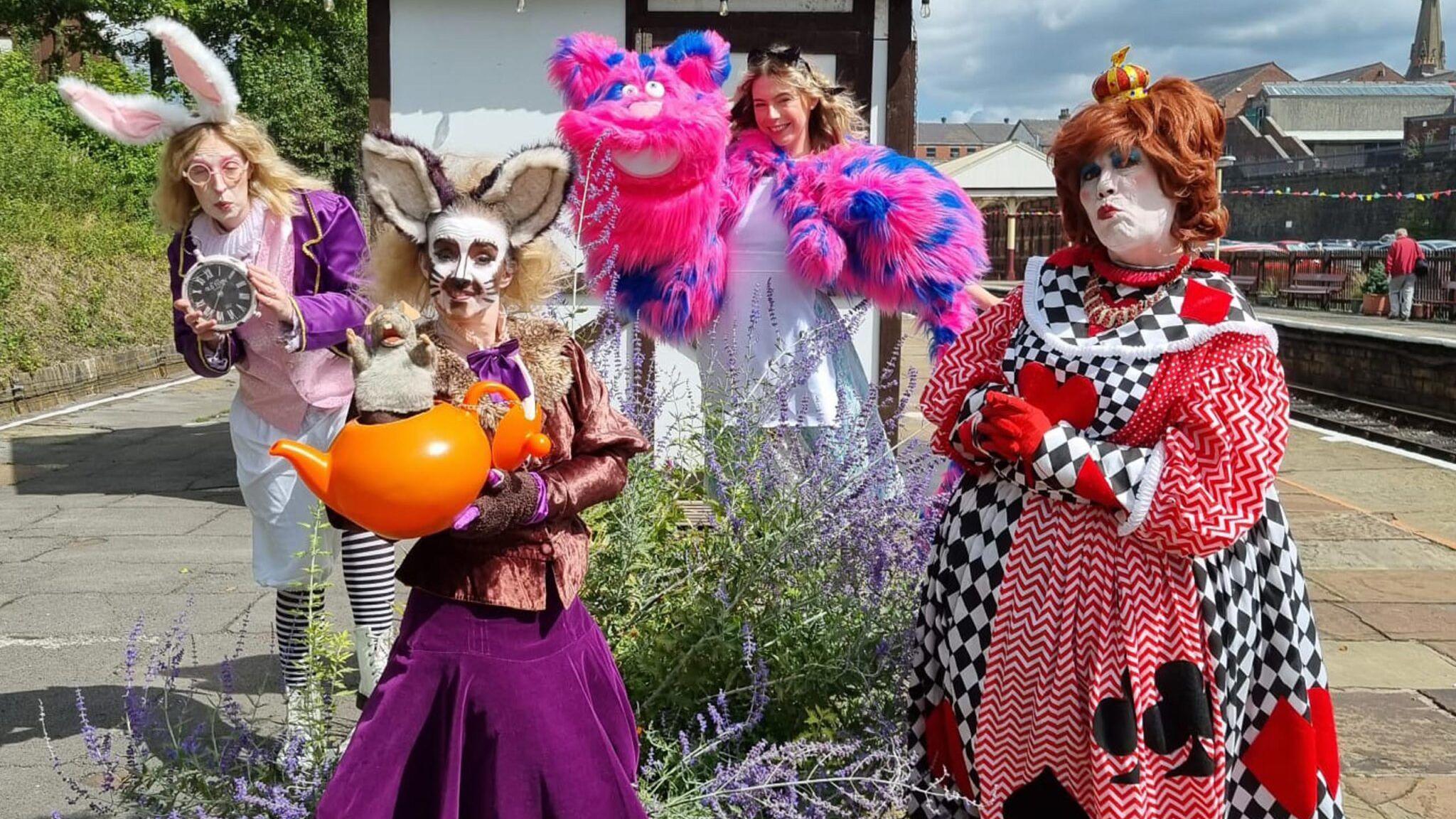 People in fancy dress as part of railway fun days