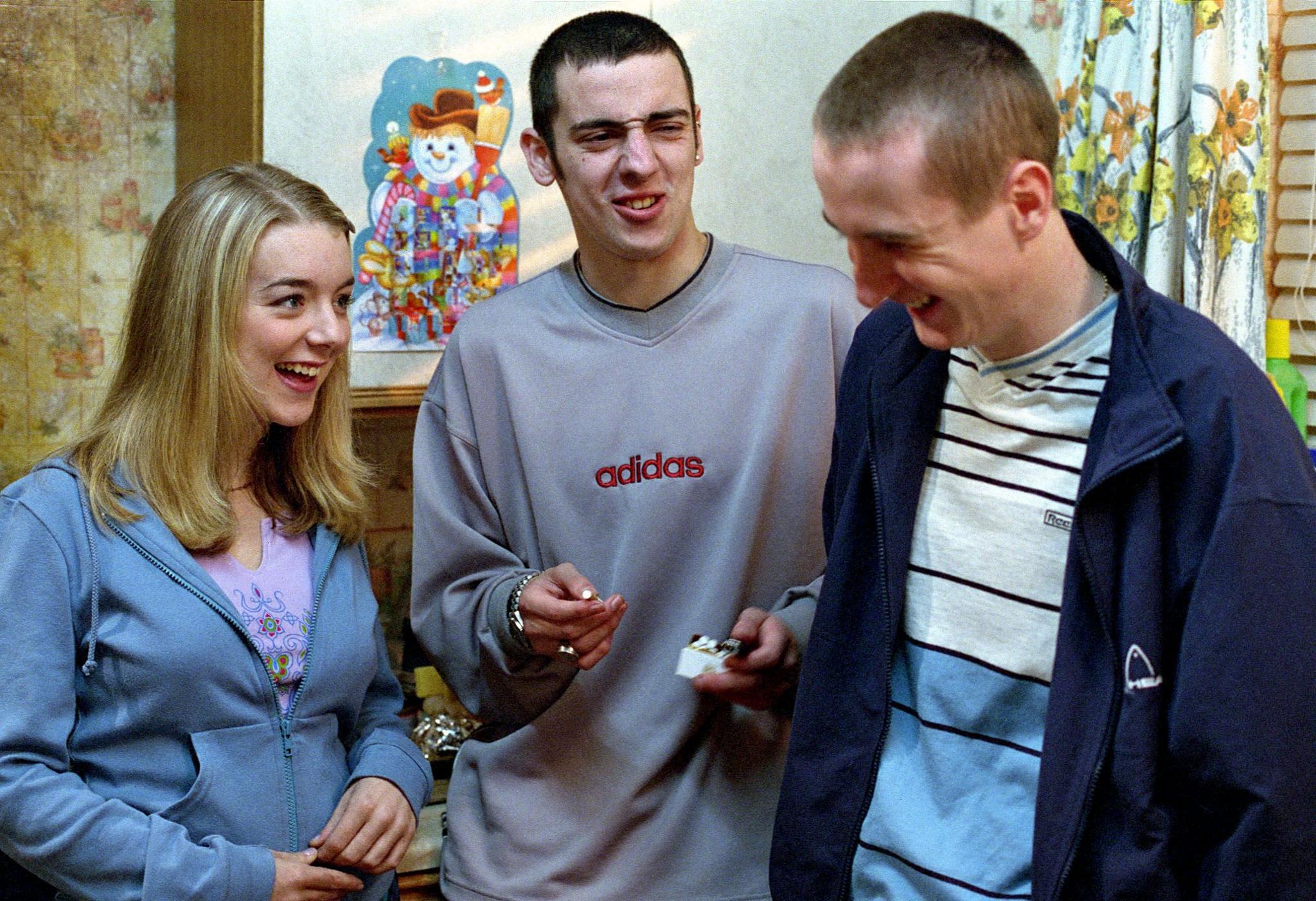 Sheridan Smith, Ralf Little and Andrew Whyment as Emma, Anthony and Darren in the Royle kitchen, laughing together.