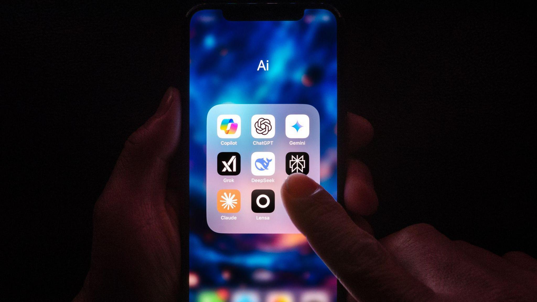 AI apps on a phone screen, including Copilot, ChatGPT, Gemini, Grok, DeepSeek, Claude and Lensa.