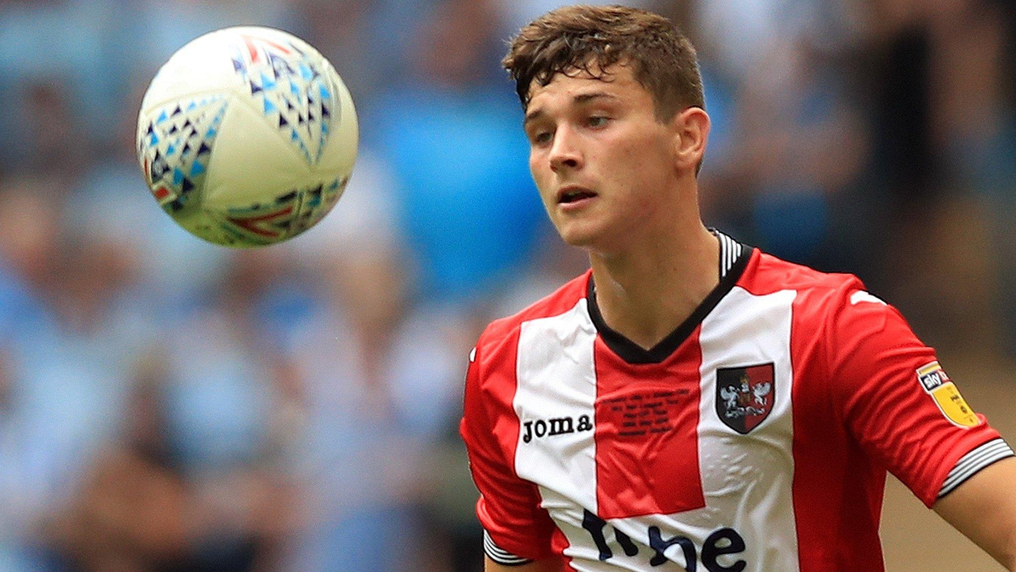 Jordan Storey in action for Exeter City