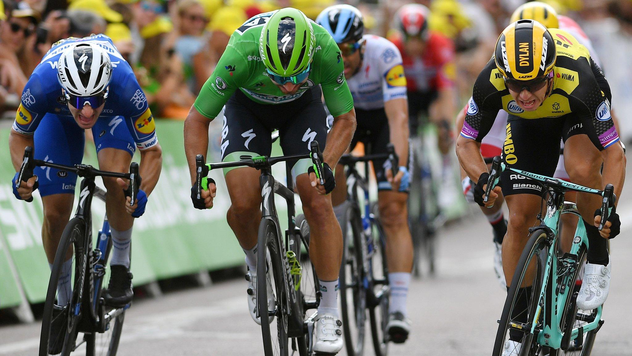 Elia Viviani (left), Peter Sagan (centre) and Dylan Groenewegen (right)