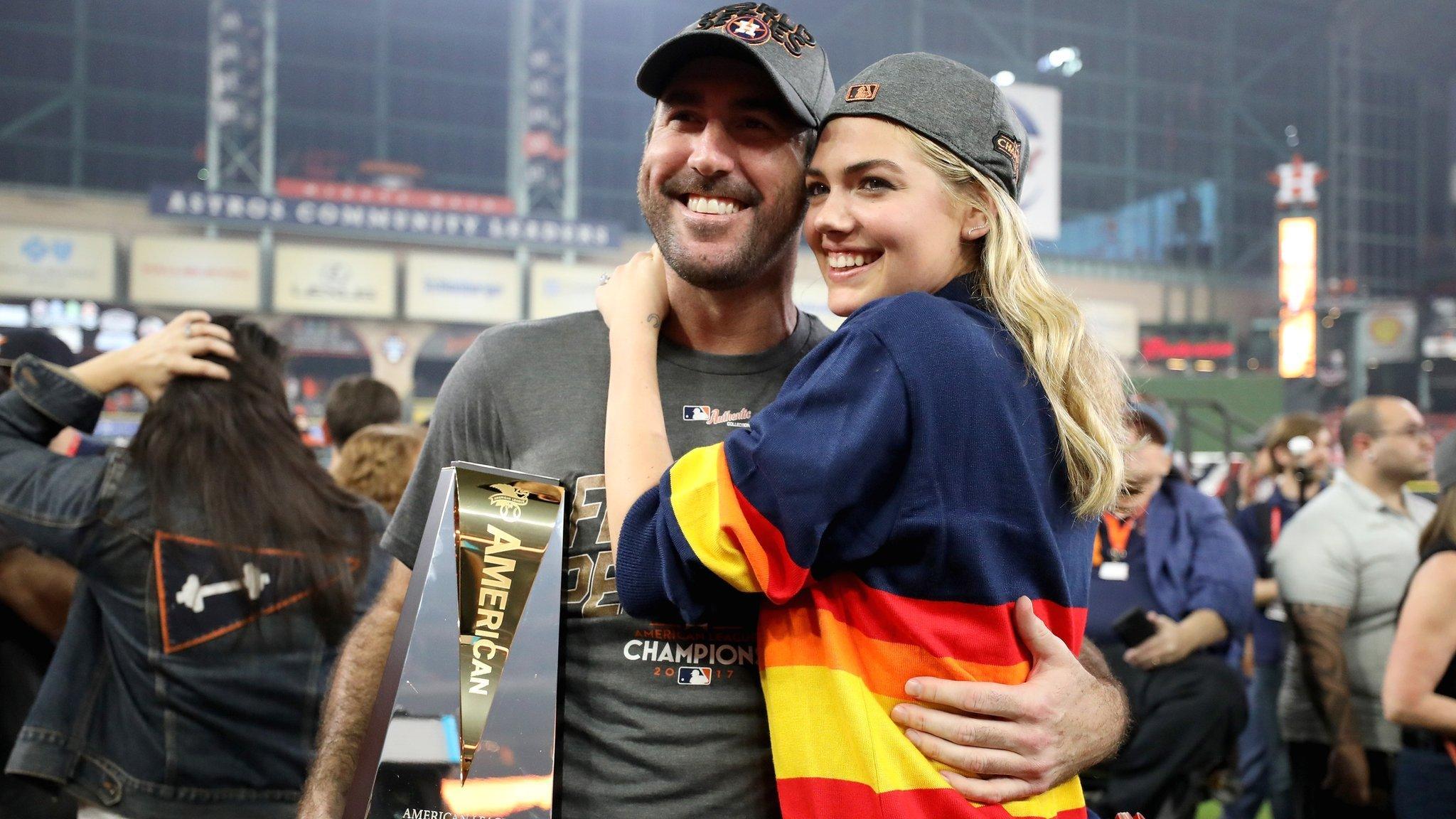 Houston Astros pitcher Justin Verlander with fiancee Kate Upton and the MVP trophy