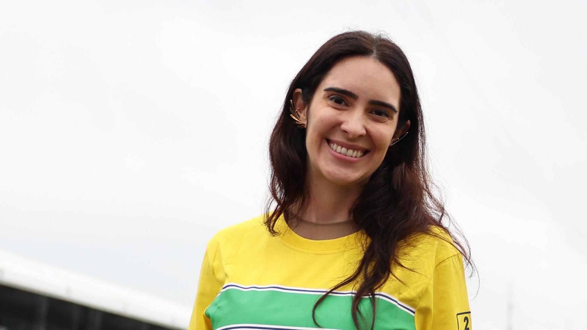 Lalalli Senna, the niece of Ayrton Senna, pictured wearing the colours of his helmet