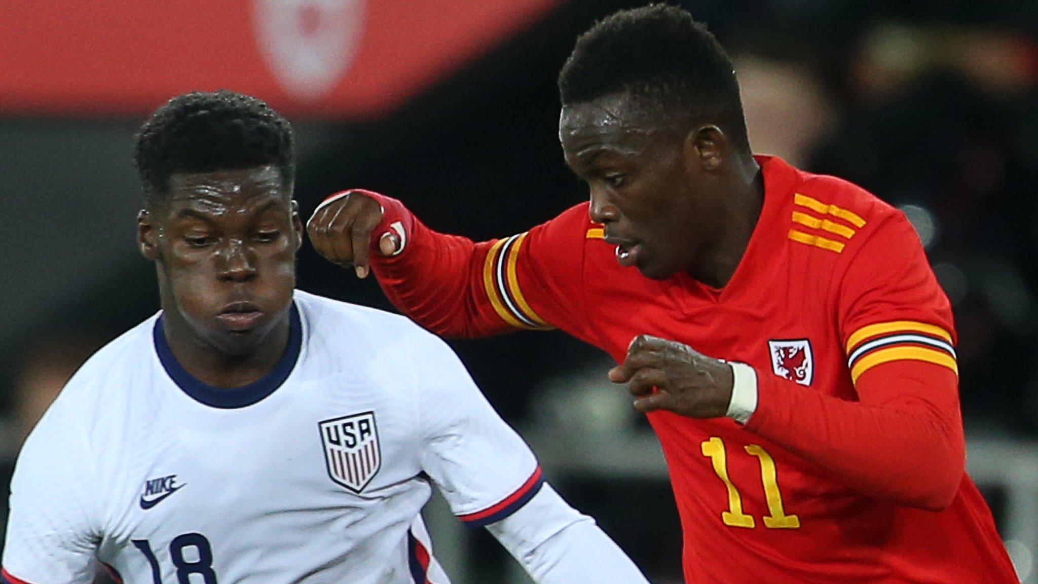 Wales' Rabbi Matondo (right) challenges Yunus Musah of the USA