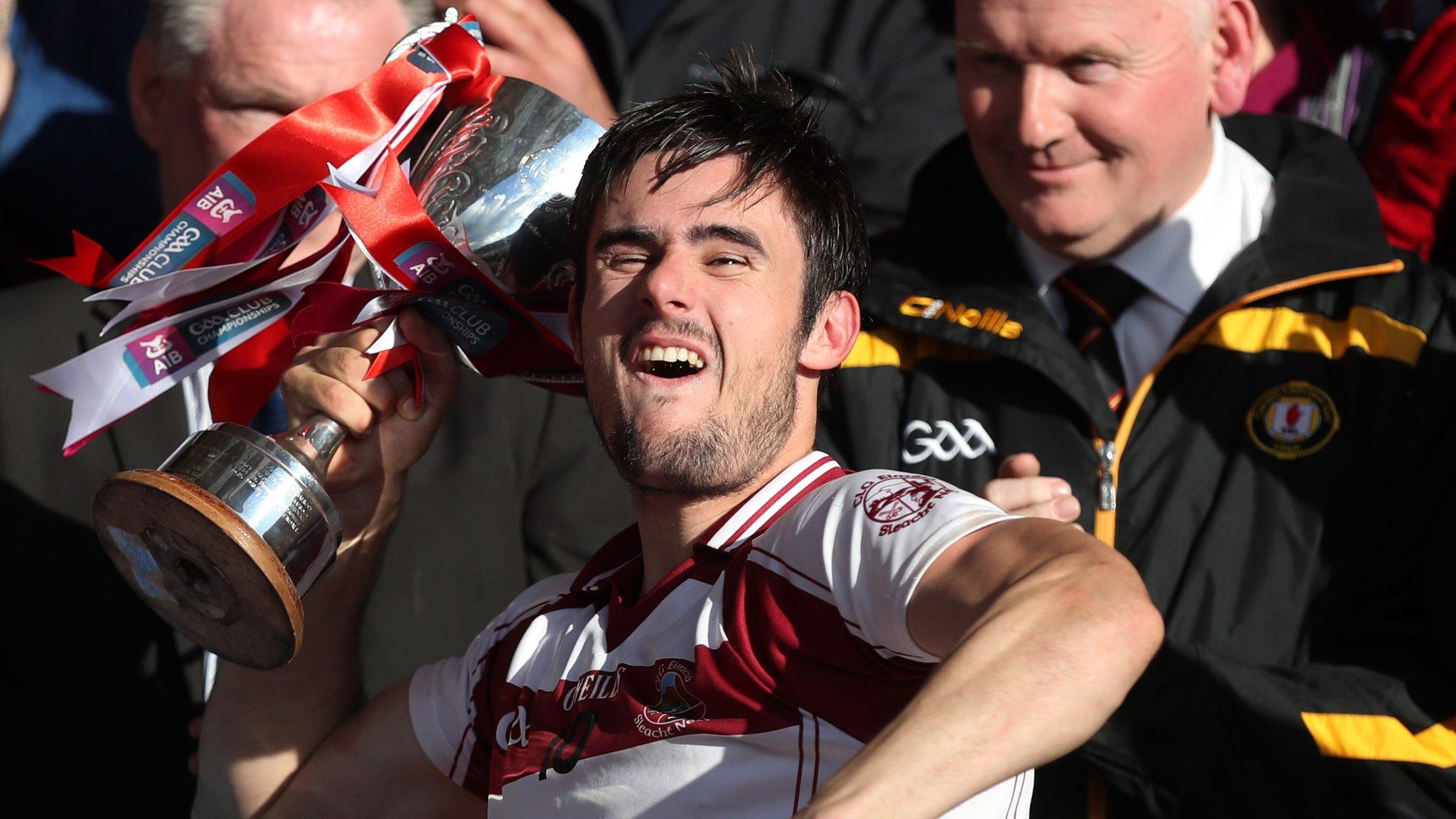 Slaughtneil captain Chrissy McKaigue lifts the Four Seasons Cup at Armagh