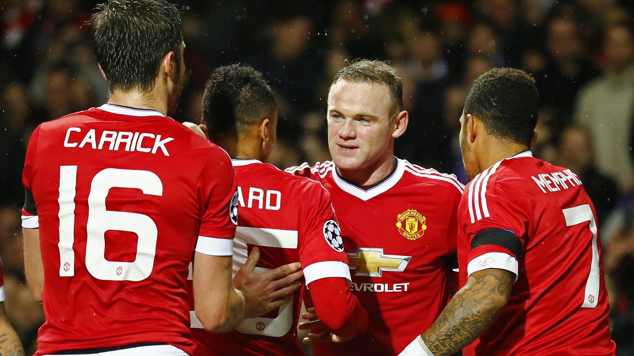 Wayne Rooney and his Manchester United team-mates