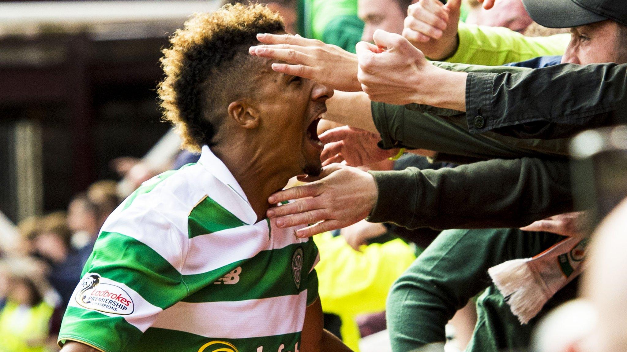 Scott Sinclair celebrates his winner with Celtic fans at Tynecastle