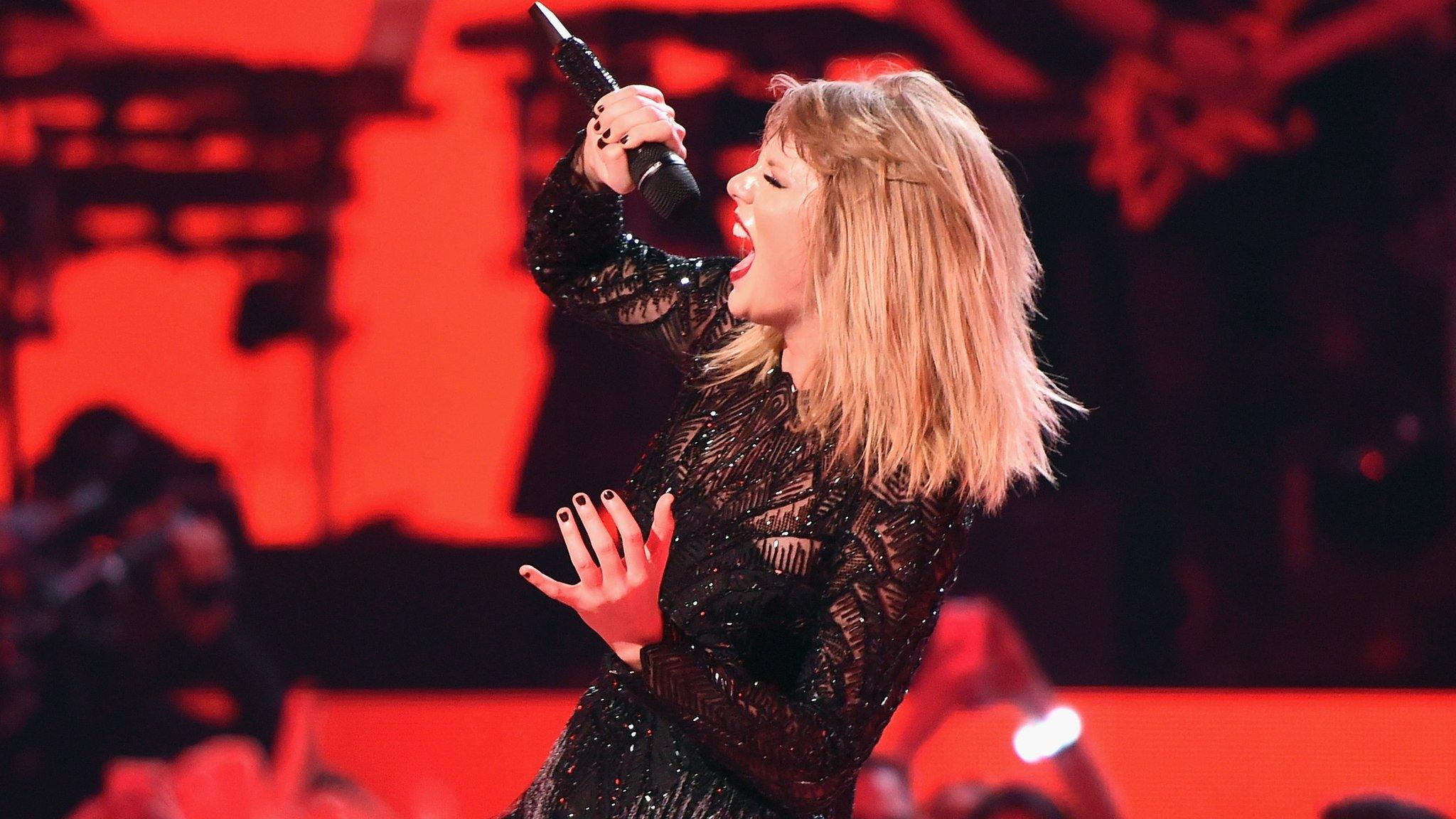 Taylor performing in February