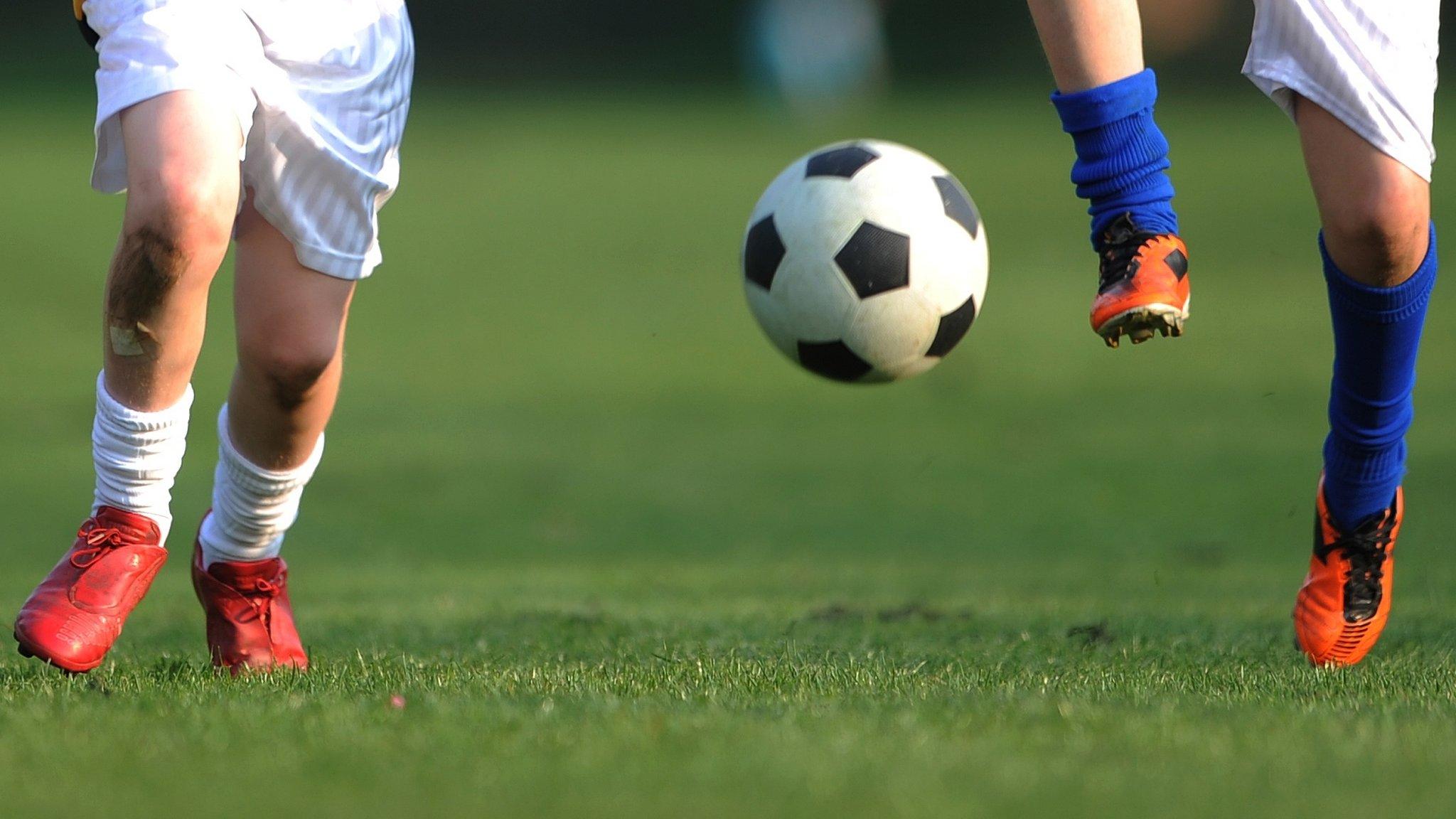 Children playing football