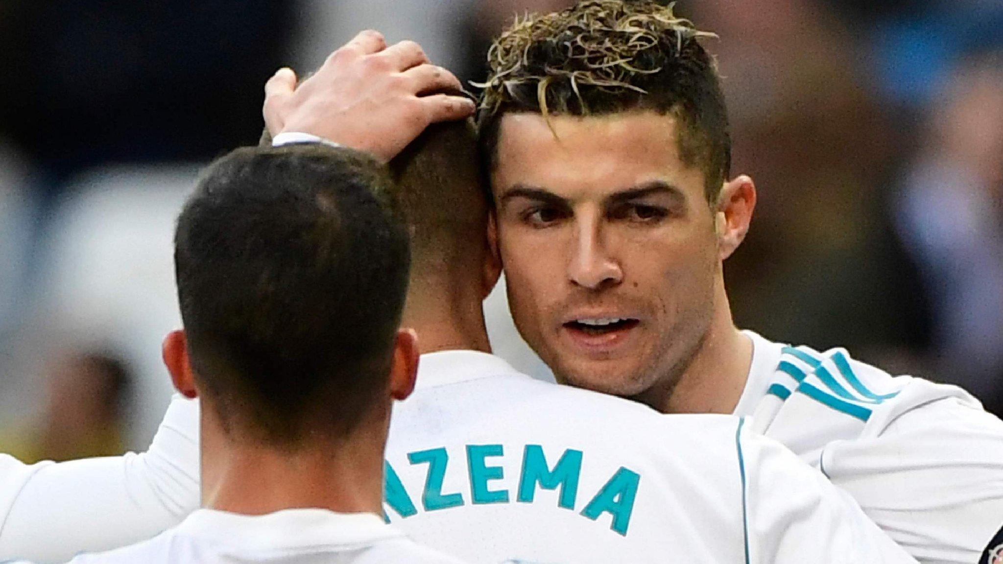 Cristiano Ronaldo hugs Karim Benzema