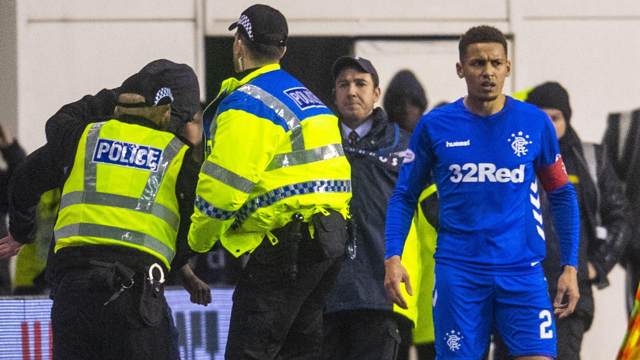 Rangers captain James Tavernier was confronted by a fan on the sidelines on Friday at Easter Road