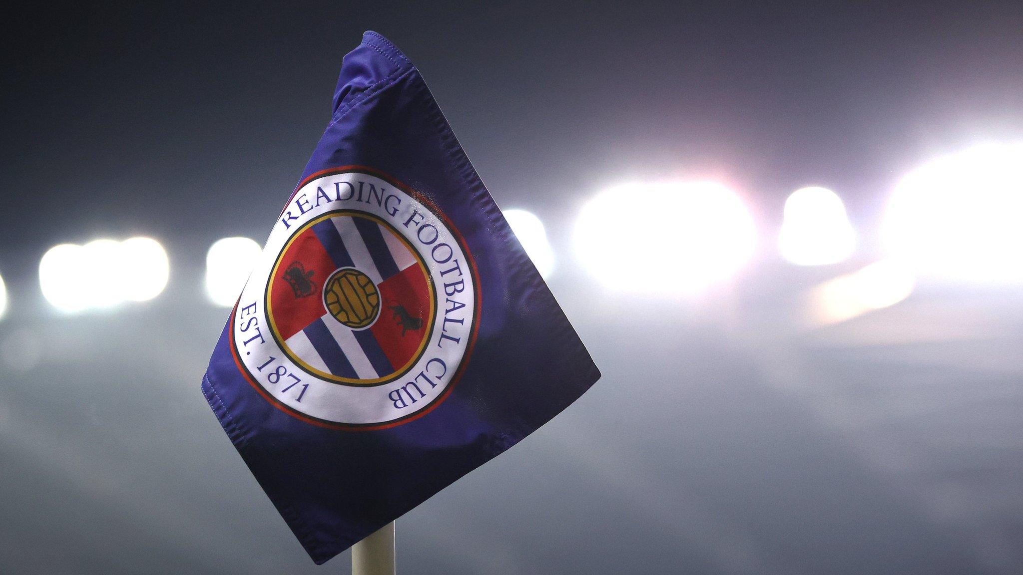 A corner flag under the lights at Reading FC's Select Car Leasing Stadium.