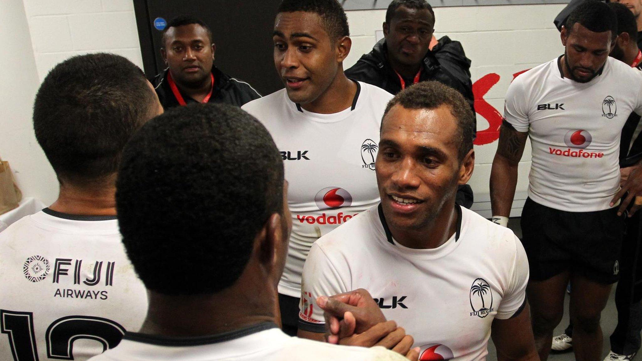 Fiji's players celebrate winning the World Rugby Sevens Series title