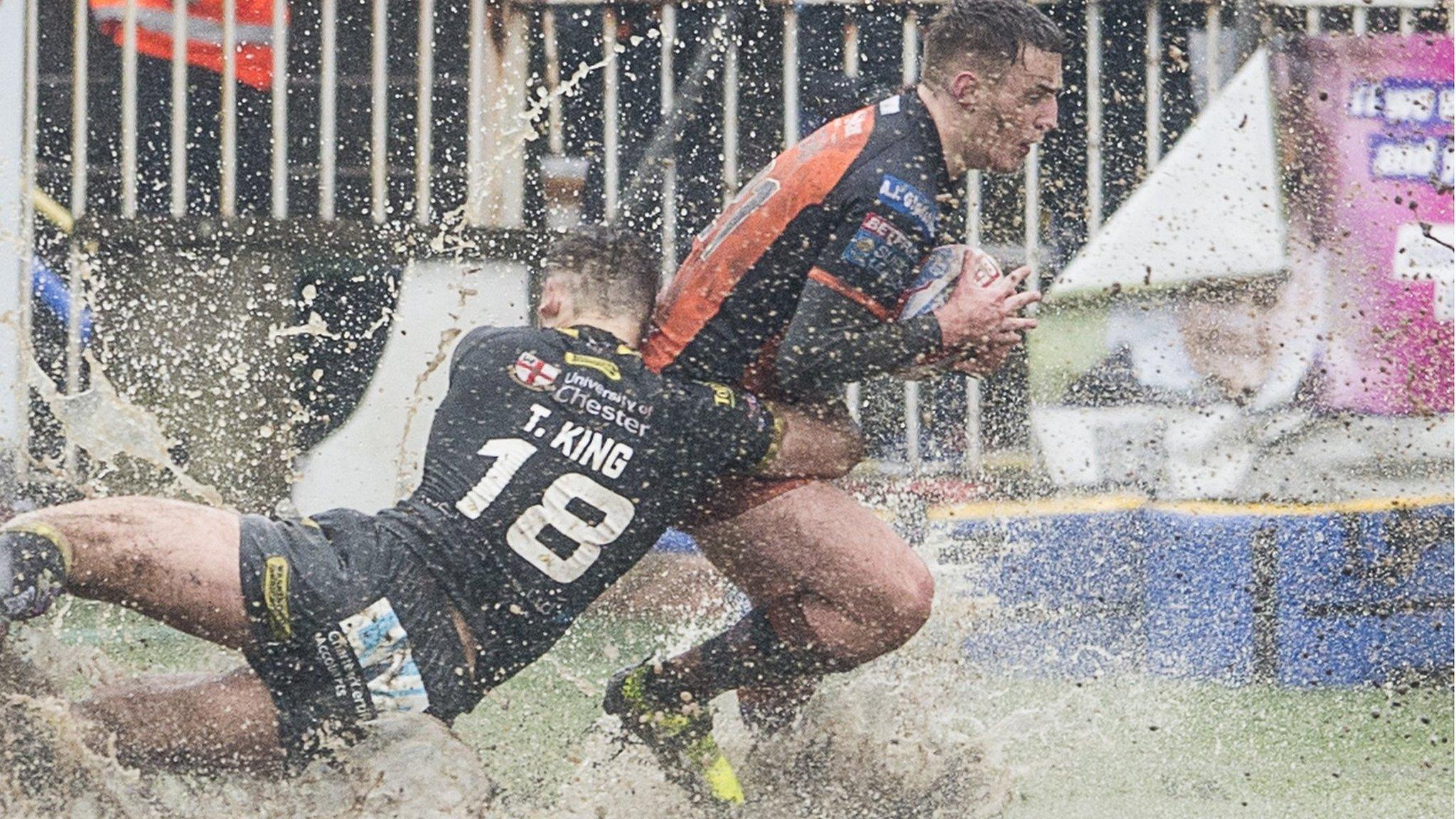 Castleford's Jake Trueman is tackled by Warrington's Toby King