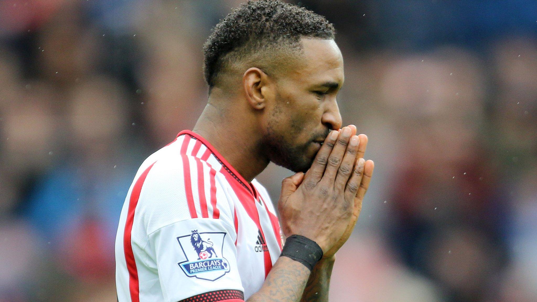 Jermain Defoe reacts to a missed chance