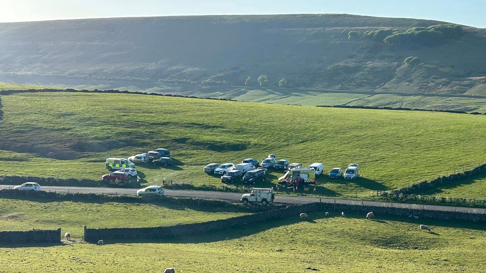 A view of the scale of the operation in the fields viewed from a nearby hilltop
