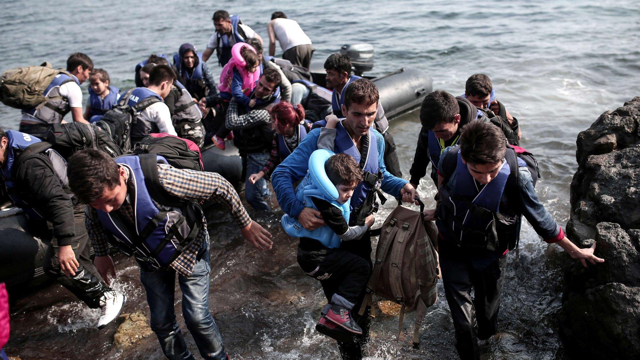 Syrian refugees land on Lesbos on 3 September 2015