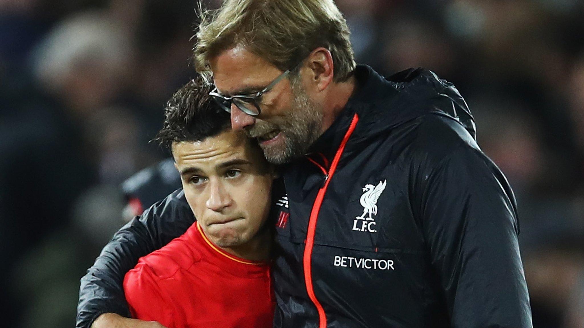 Liverpool playmaker Philippe Coutinho (left) and Reds manager Jurgen Klopp