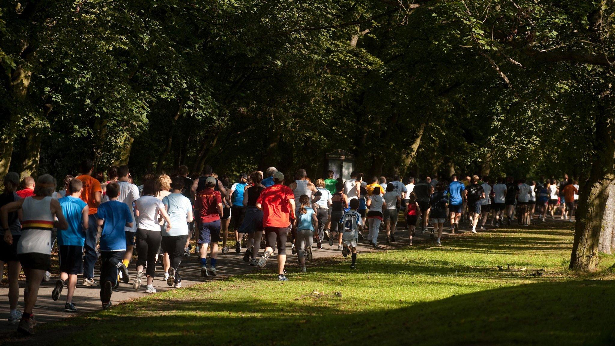 A Parkrun taking place in a park