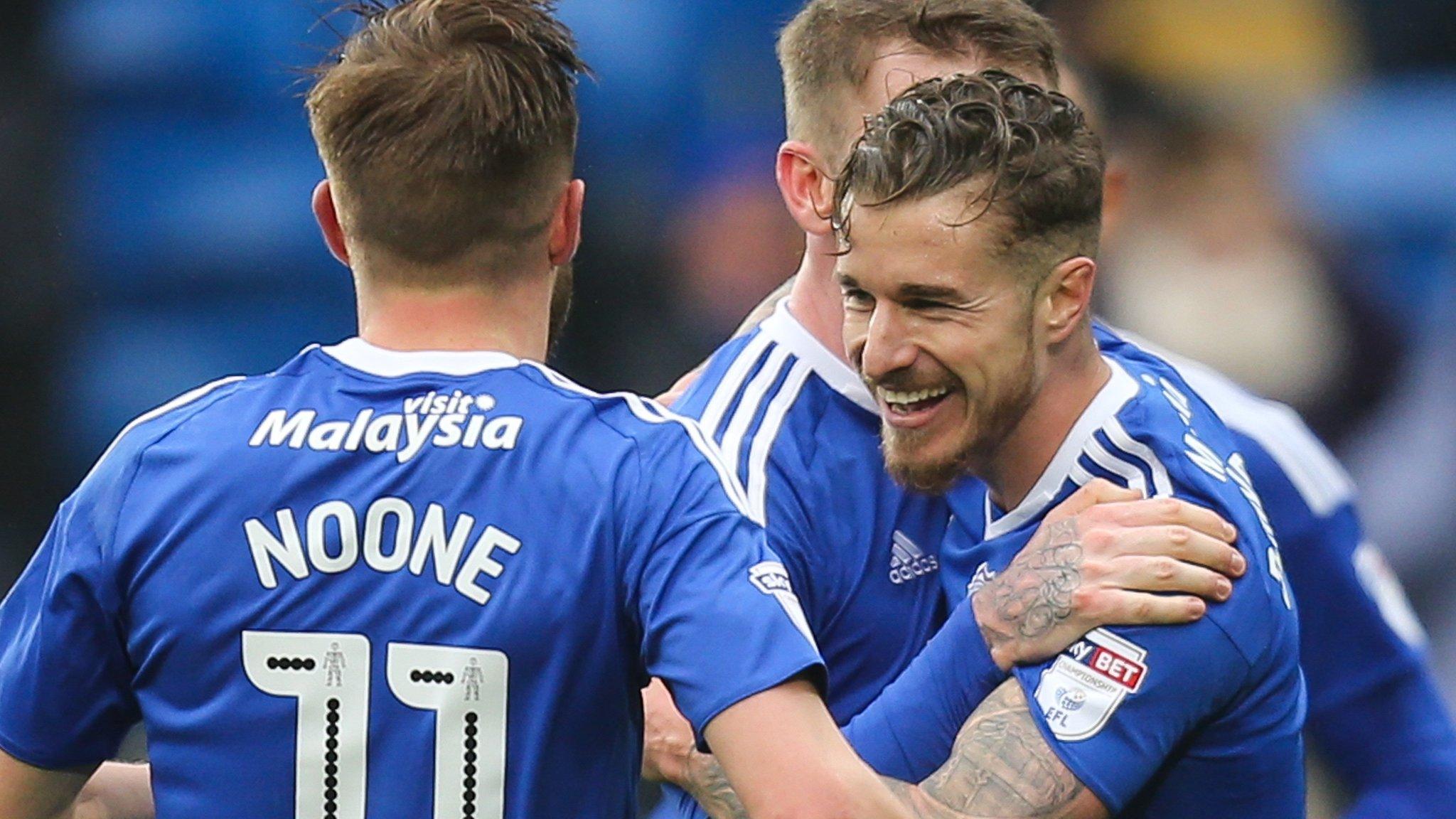 Joe Bennett celebrates after scoring Cardiff's third goal