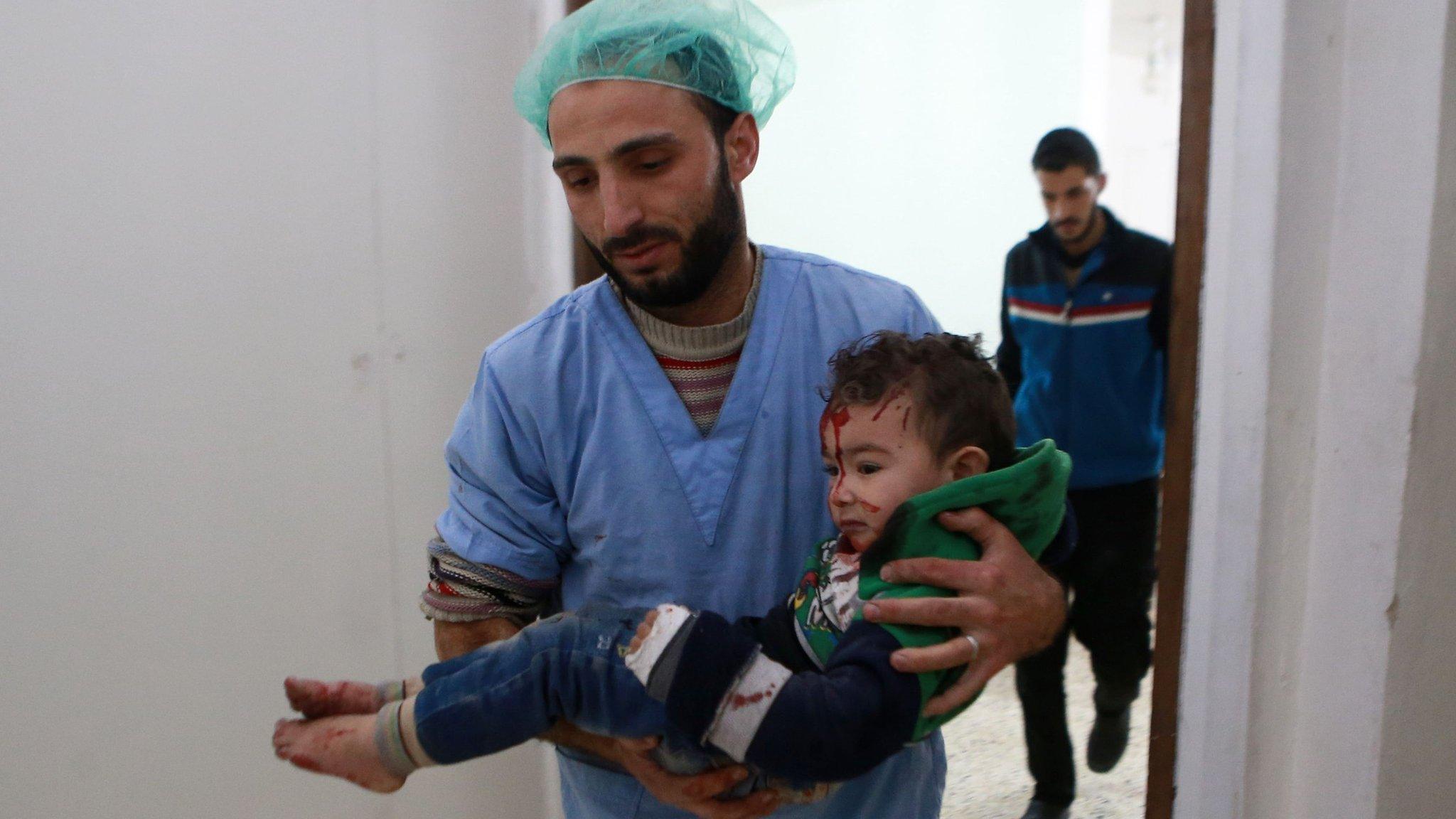 A Syrian child receives treatment at a hospital following a reported air strike in rebel-controlled Arbin, in the Eastern Ghouta area on the outskirts of Damascus (3 December 2017)