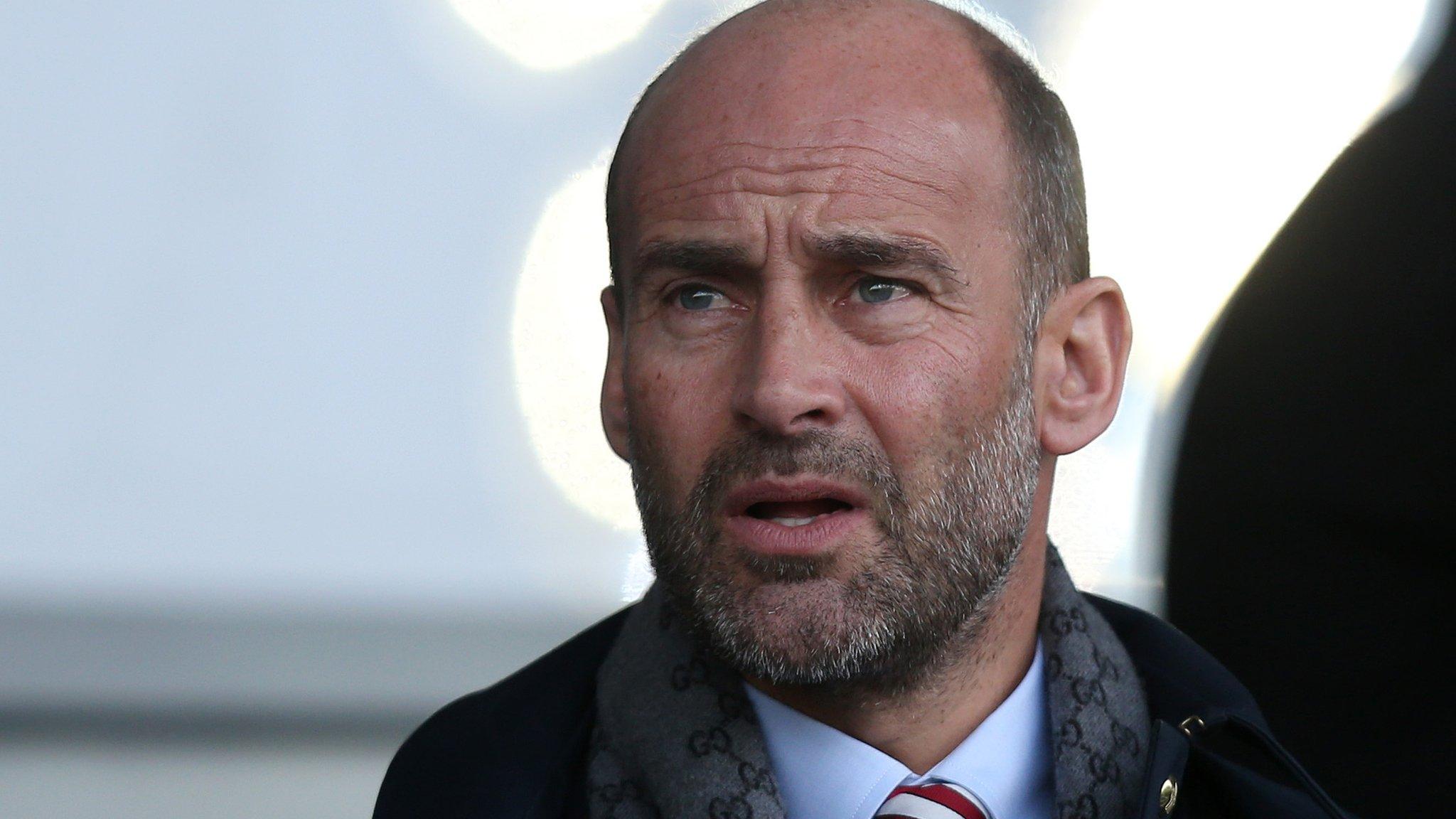 Sunderland chief executive Martin Bain looks on