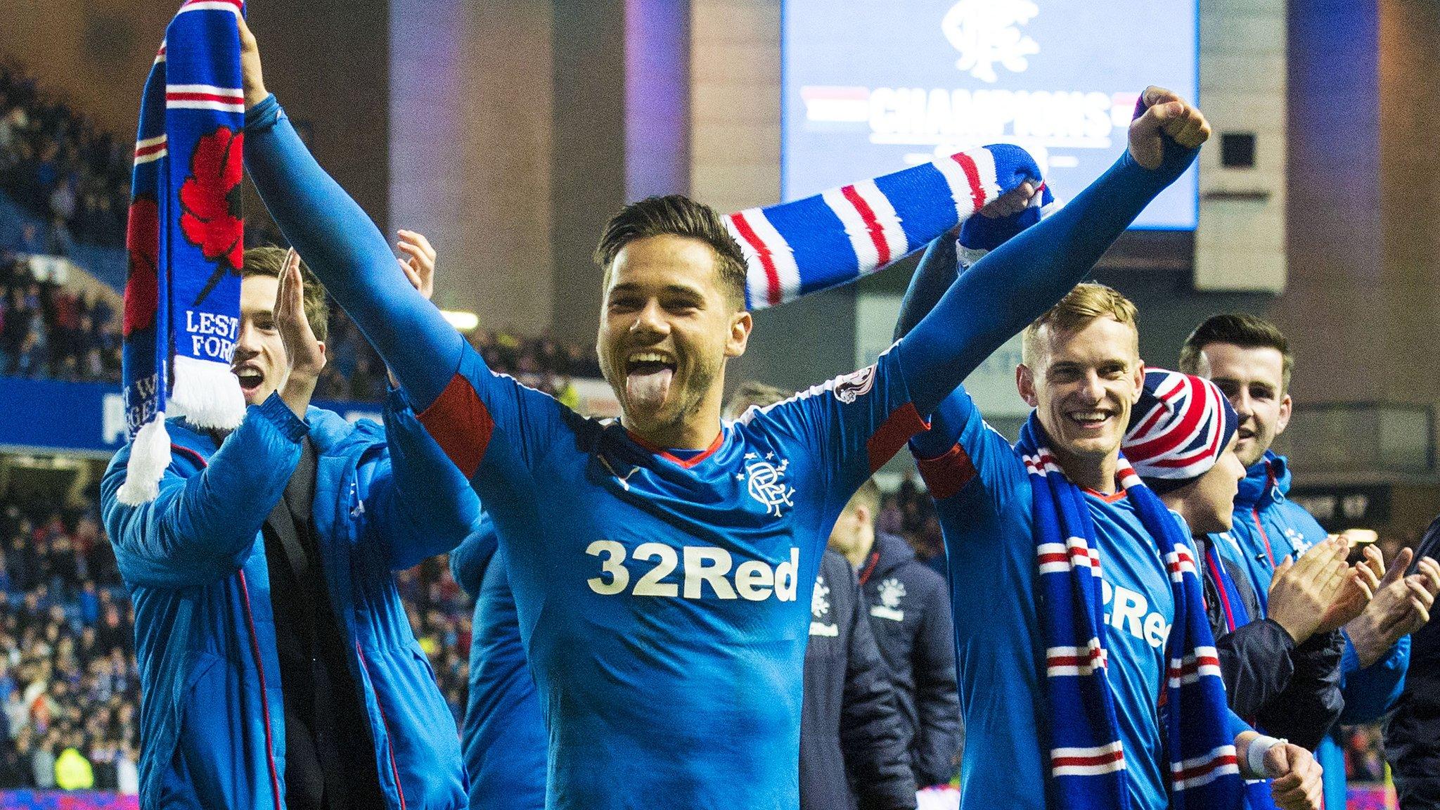 Rangers players celebrate sealing the Championship title