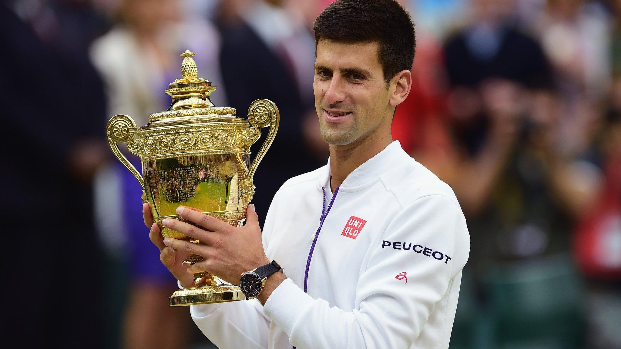 novak djokovic celebrates winning Wimbledon