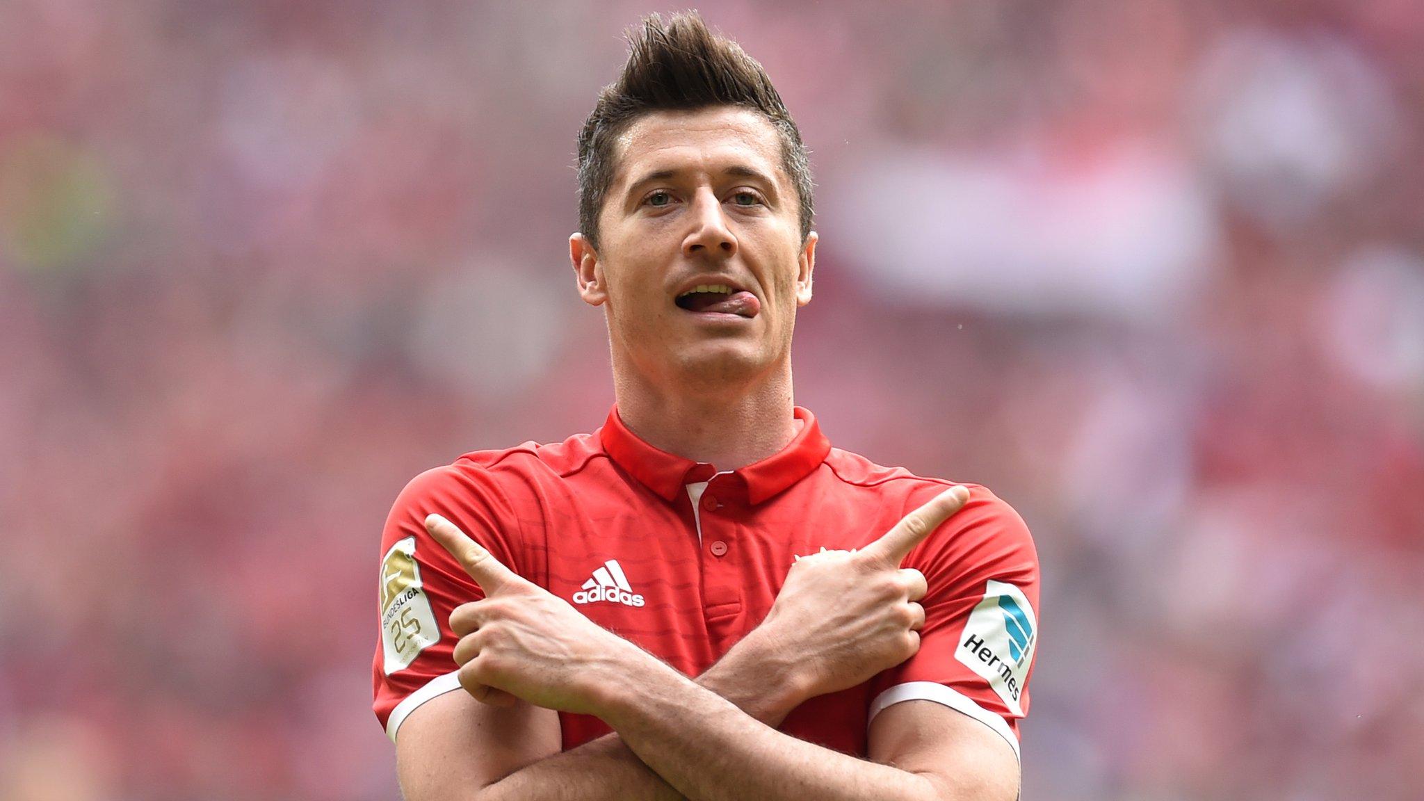 Bayern Munich striker Robert Lewandowski celebrates scoring against Augsburg