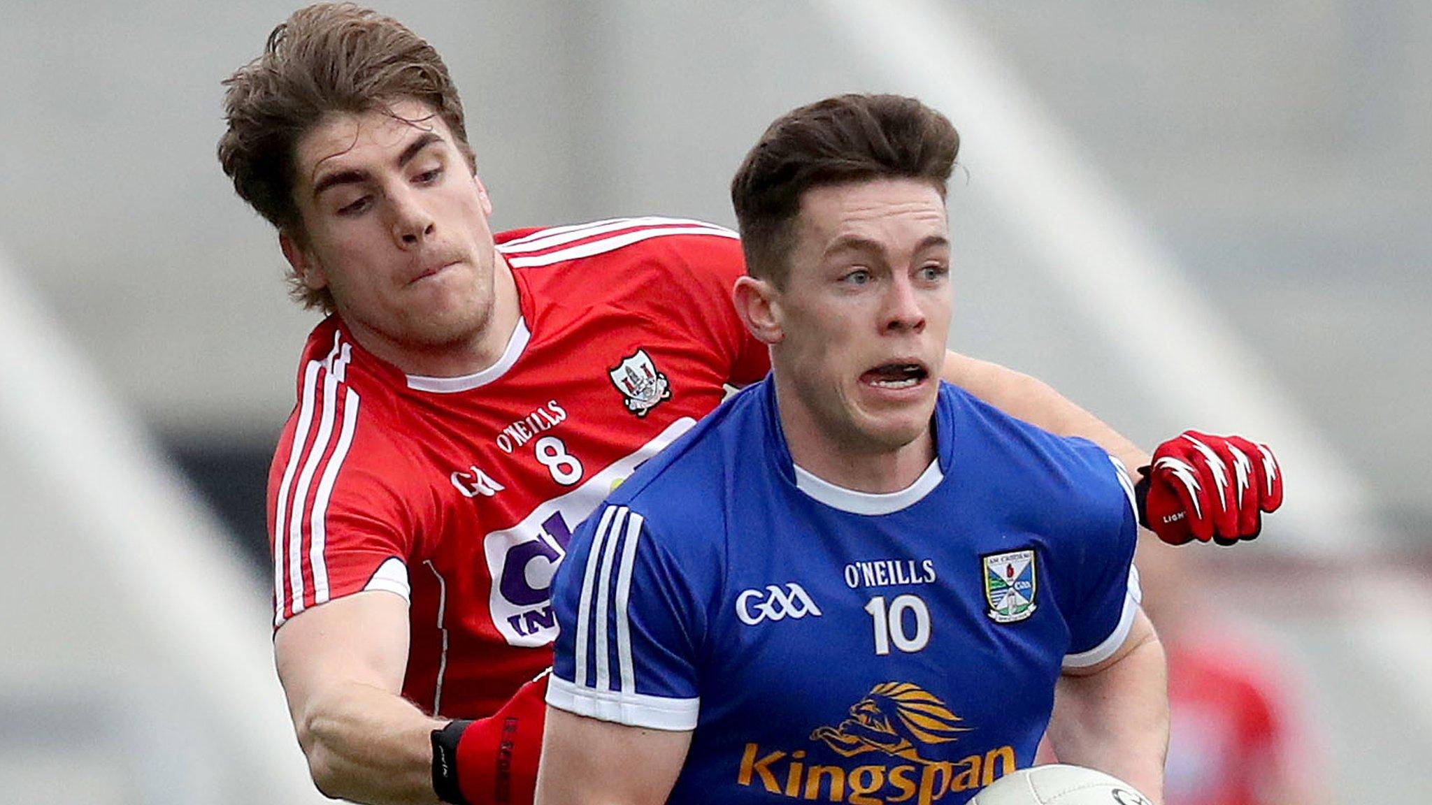 Cavan's Dara McVeety and Cork's Ian Maguire