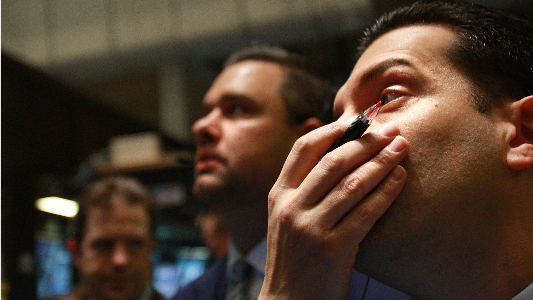 Traders work on the floor of the New York Stock Exchange moments after the opening bell October 13, 2008 in New York City during the financial crisis