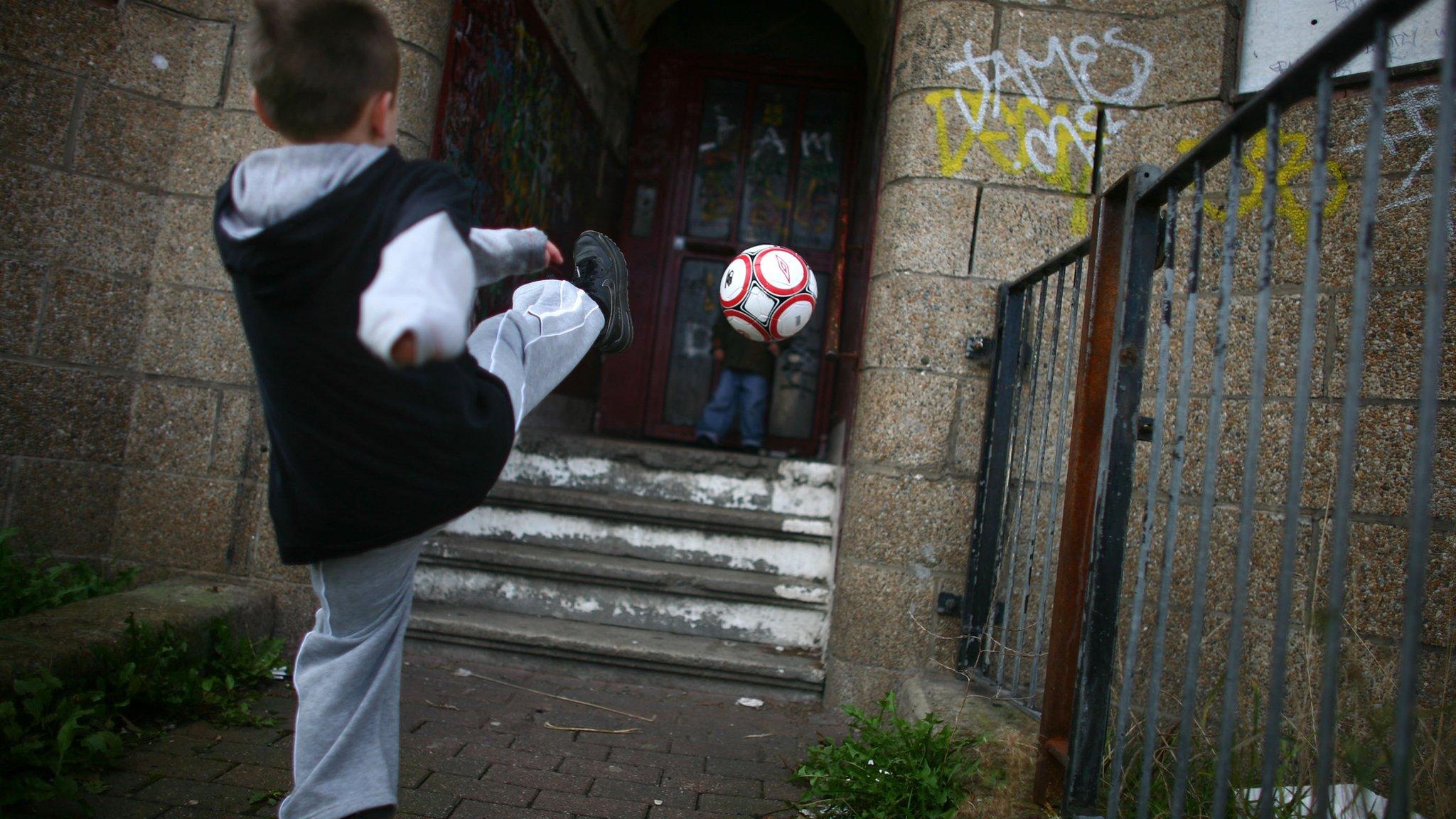 Boy playing football