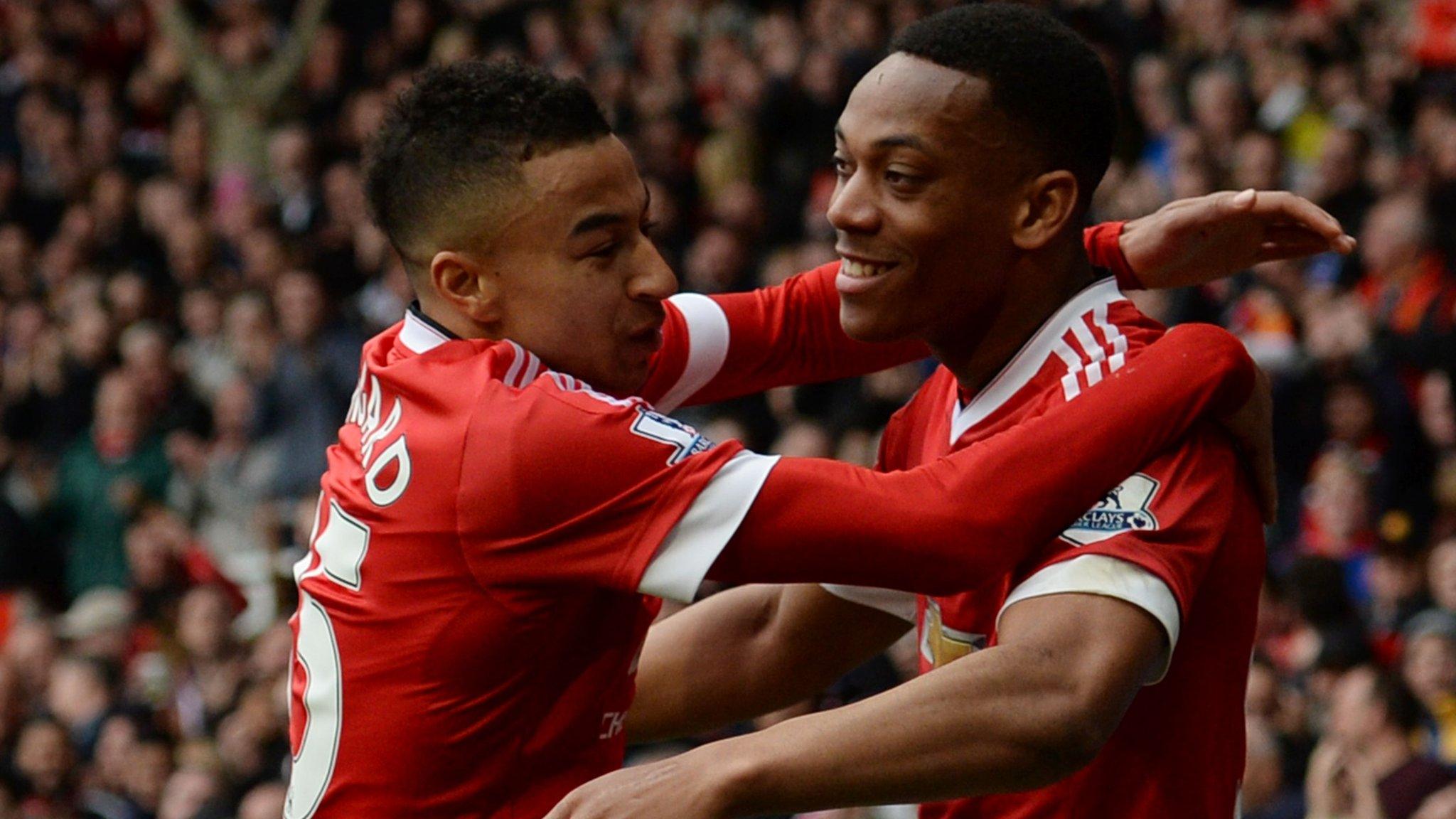 Jesse Lingard and Anthony Martial celebrate