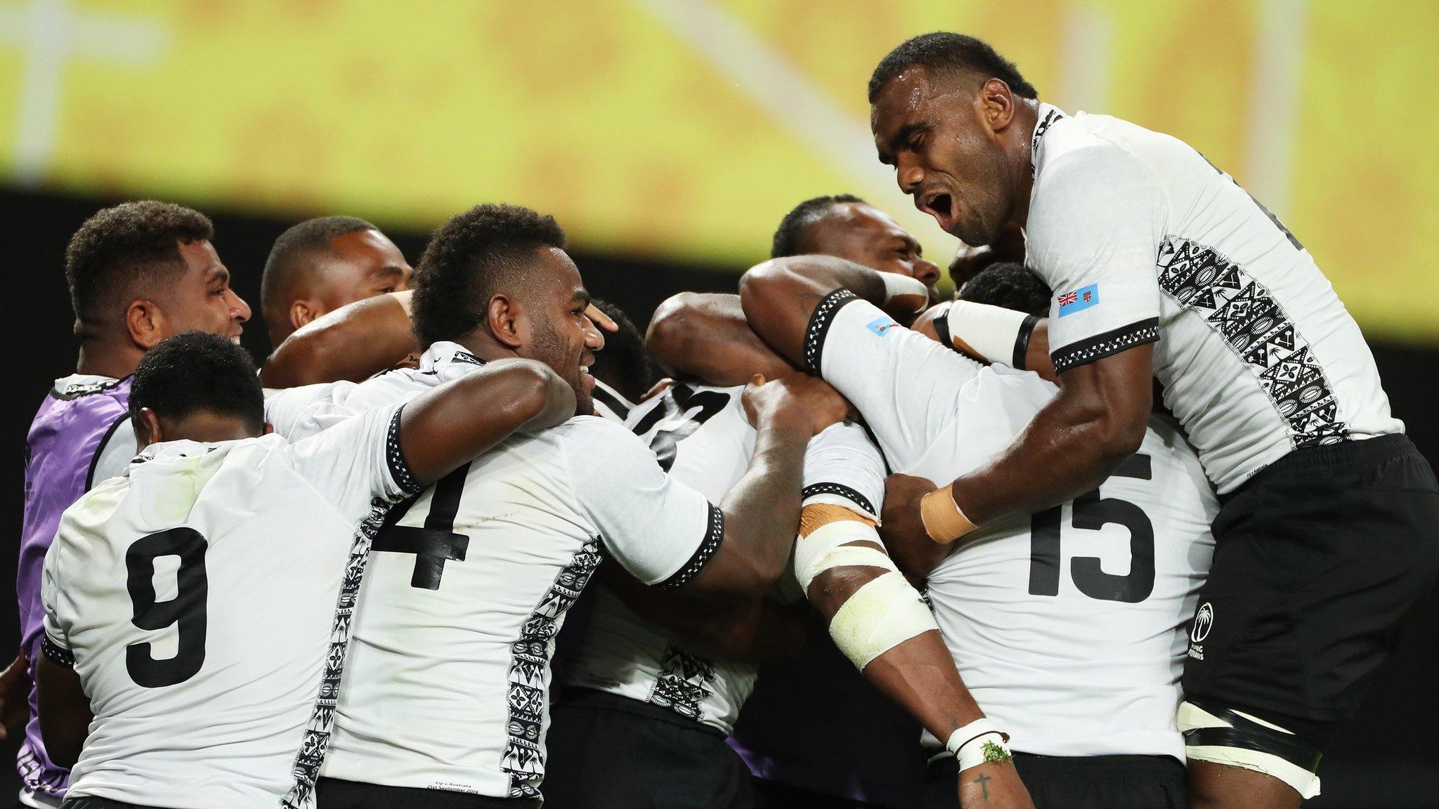 Fiji celebrate a try in their match against Australia