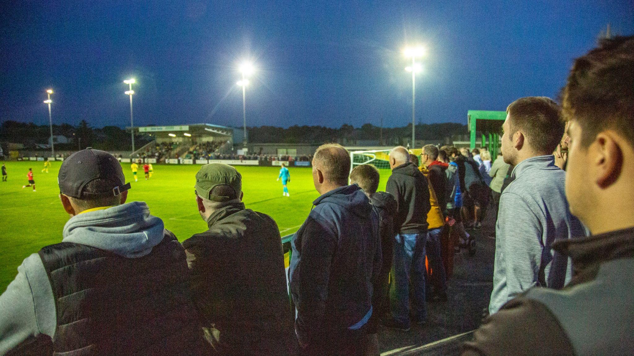 Fans watching at game at Caernarfon Town