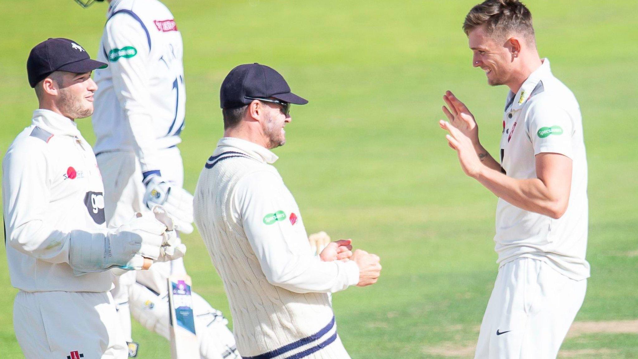 Matthew Milnes celebrates a wicket for Kent