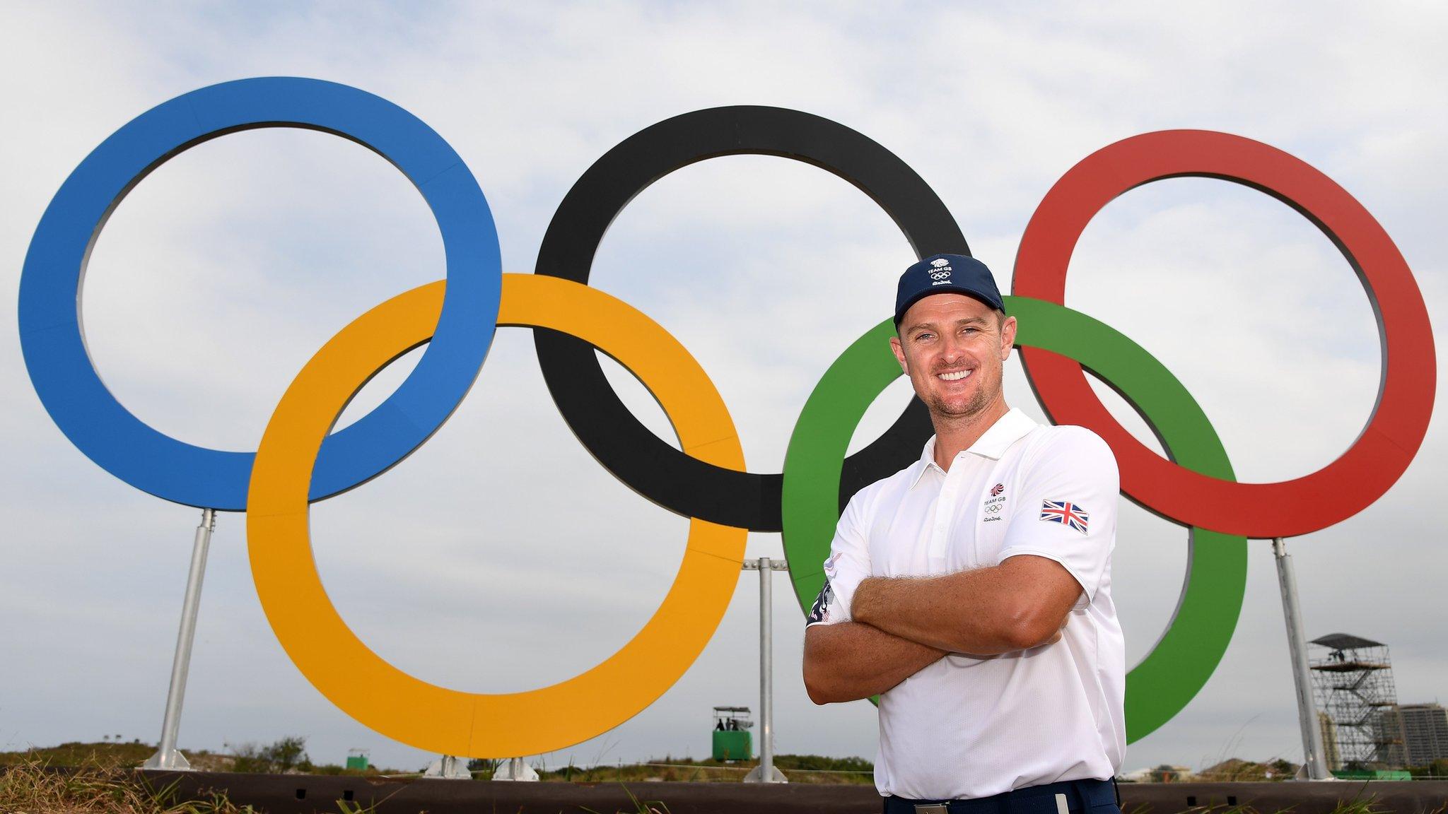 Justin Rose poses with the Olympic Rings