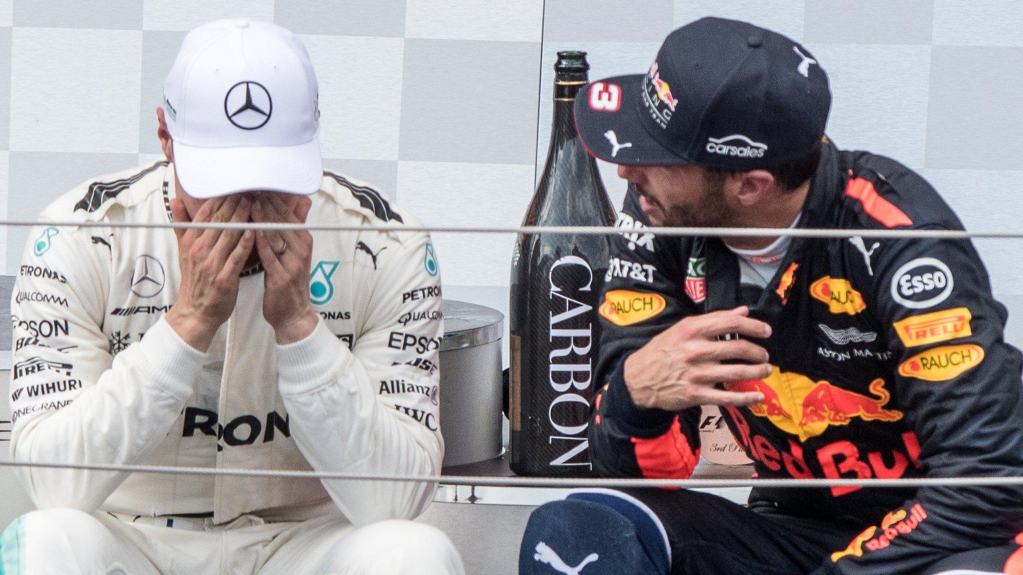 Valtteri Bottas wipes champagne from his eyes