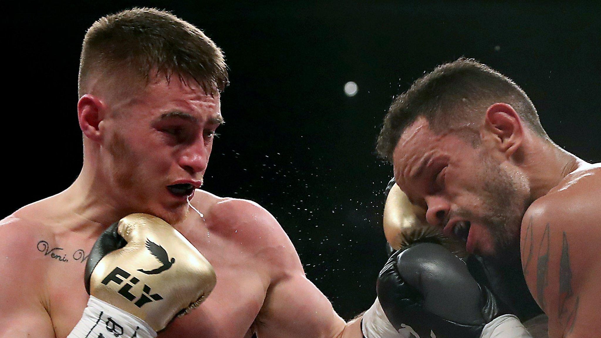 Ryan Burnett lands a left on Yonfrez Parejo in the WBA world bantamweight title bout in Cardiff