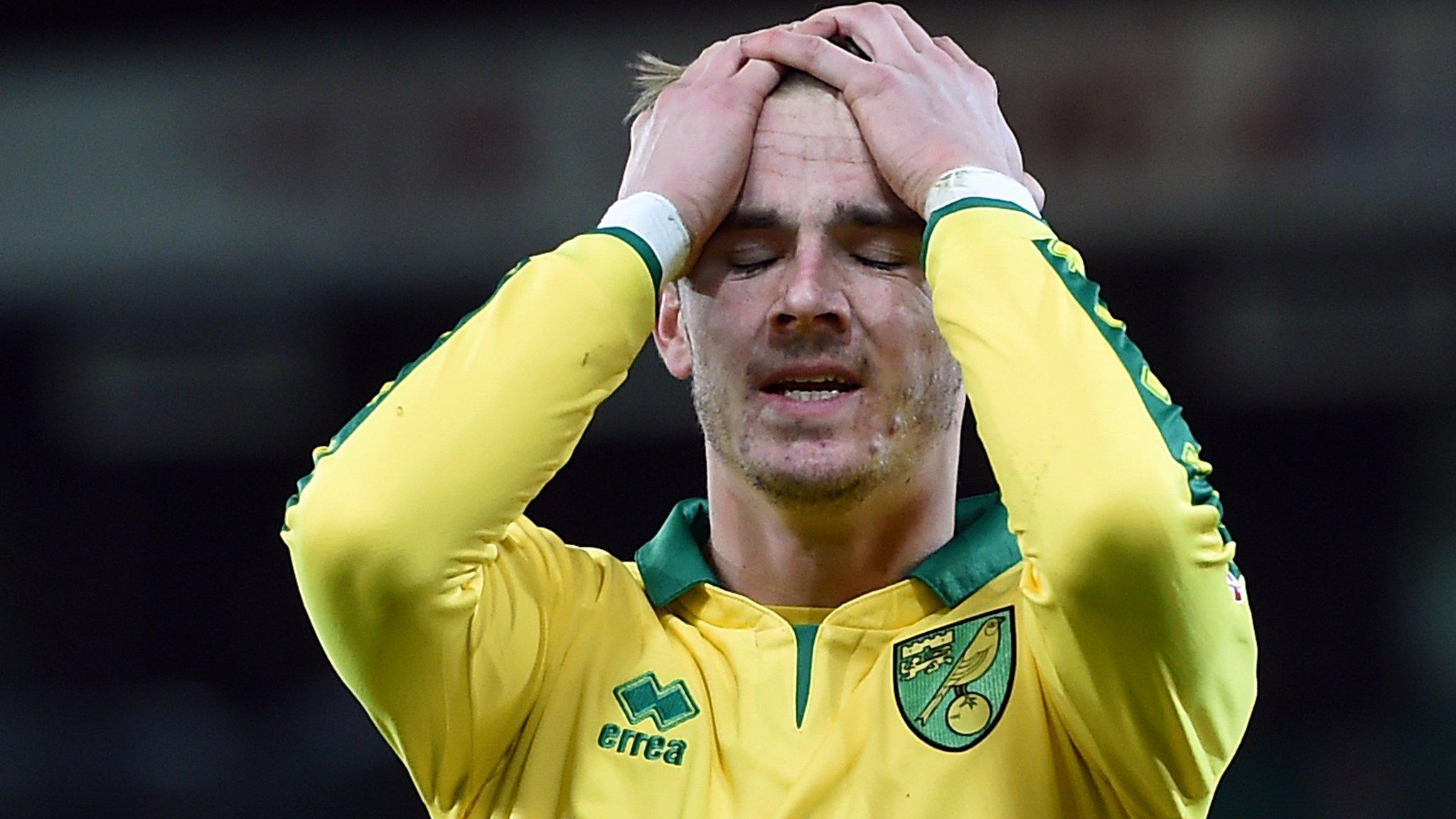 Norwich's James Maddison holds his head in his hands