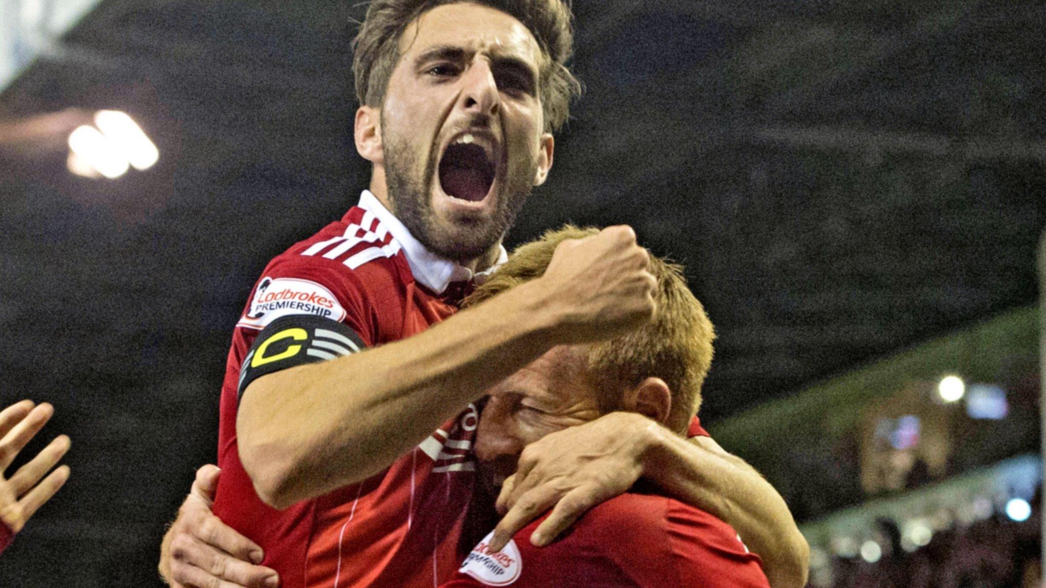 Graeme Shinnie and Adam Rooney